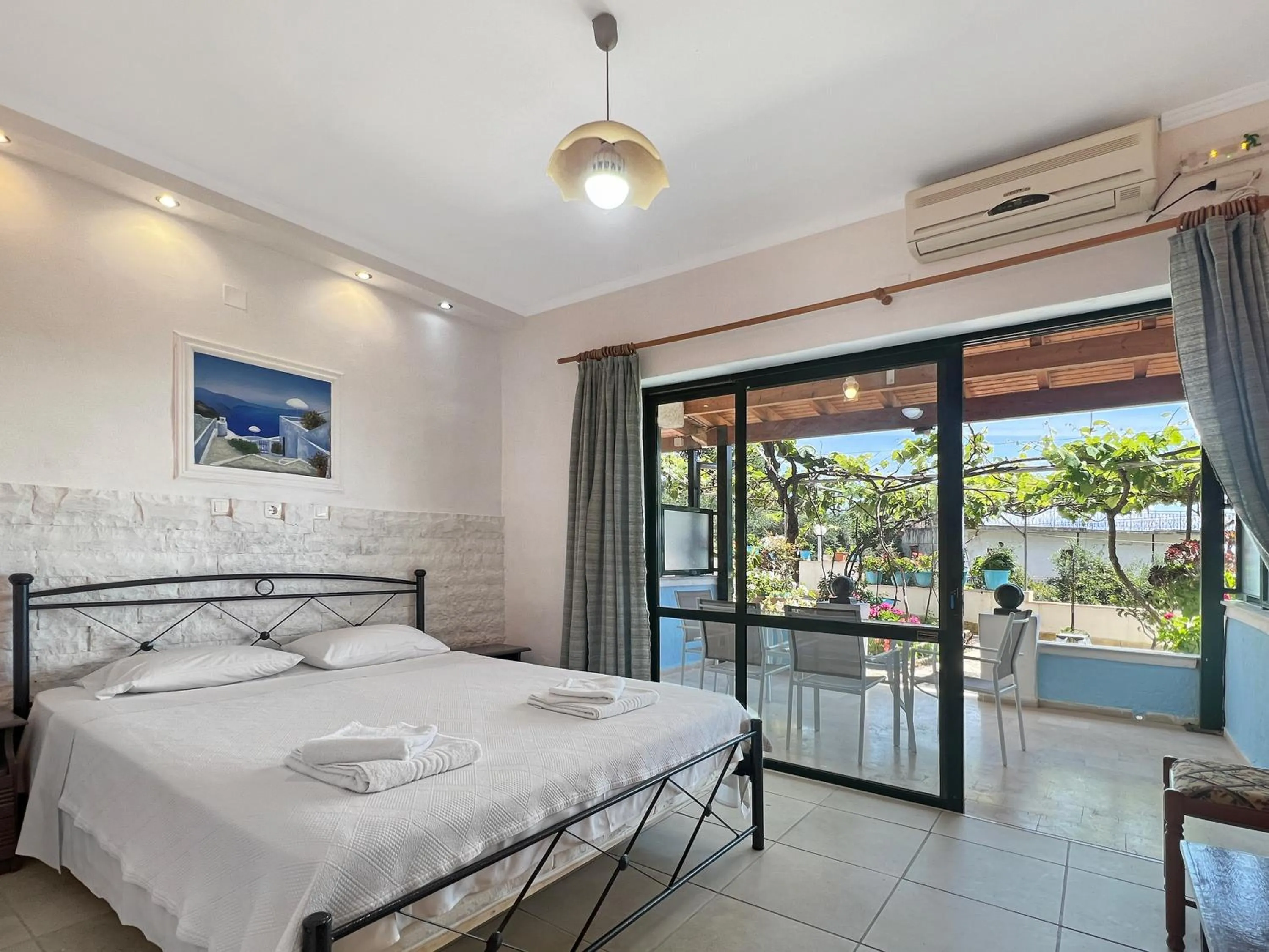 Bed in Corfu Andromaches Holiday Apartments