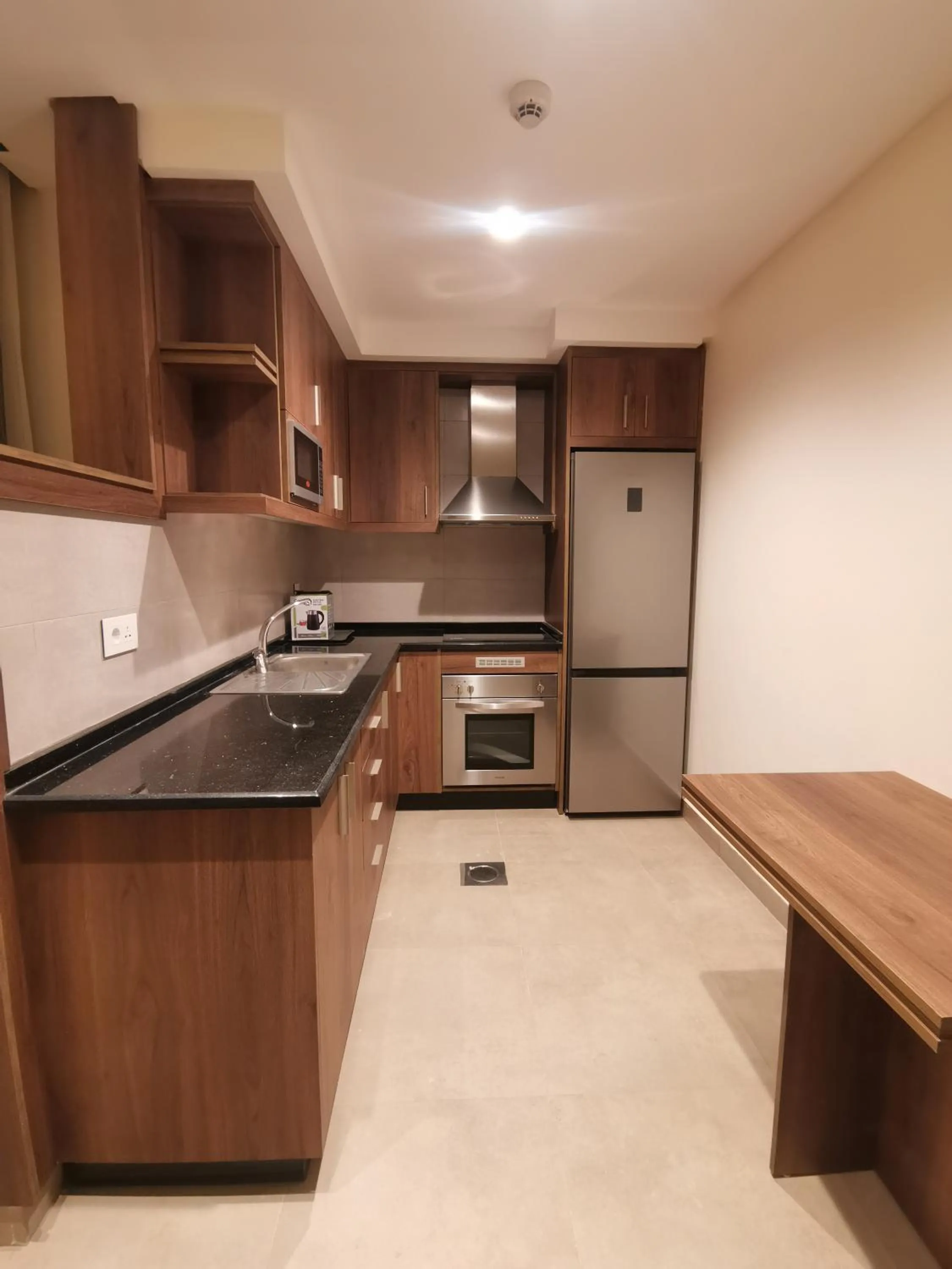 Kitchen or kitchenette in Dara apartment hotel