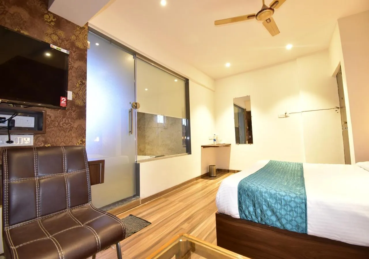 Bed in Hotel Candor Amigo Airoli Mind Space