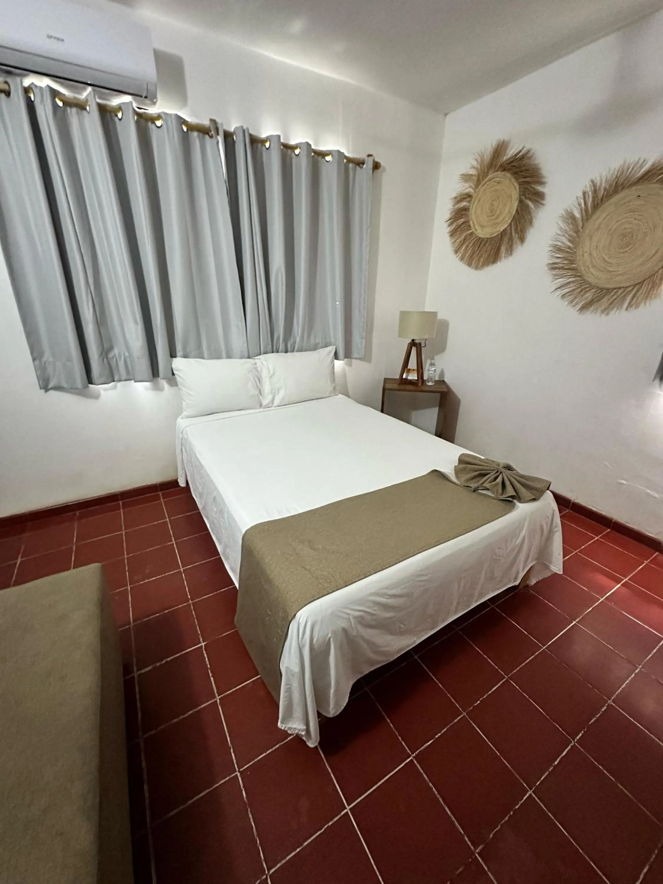 Bed in Creta Hotel & Suites