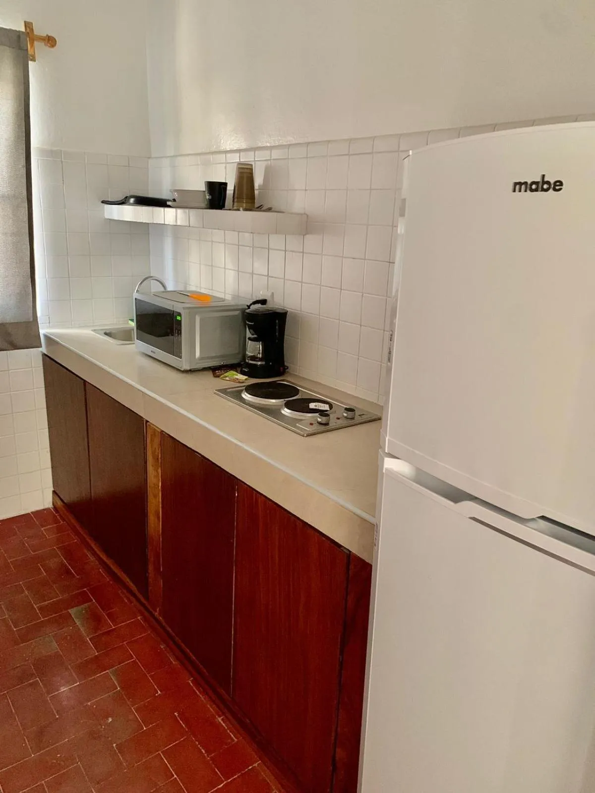 Kitchen or kitchenette in Creta Hotel & Suites