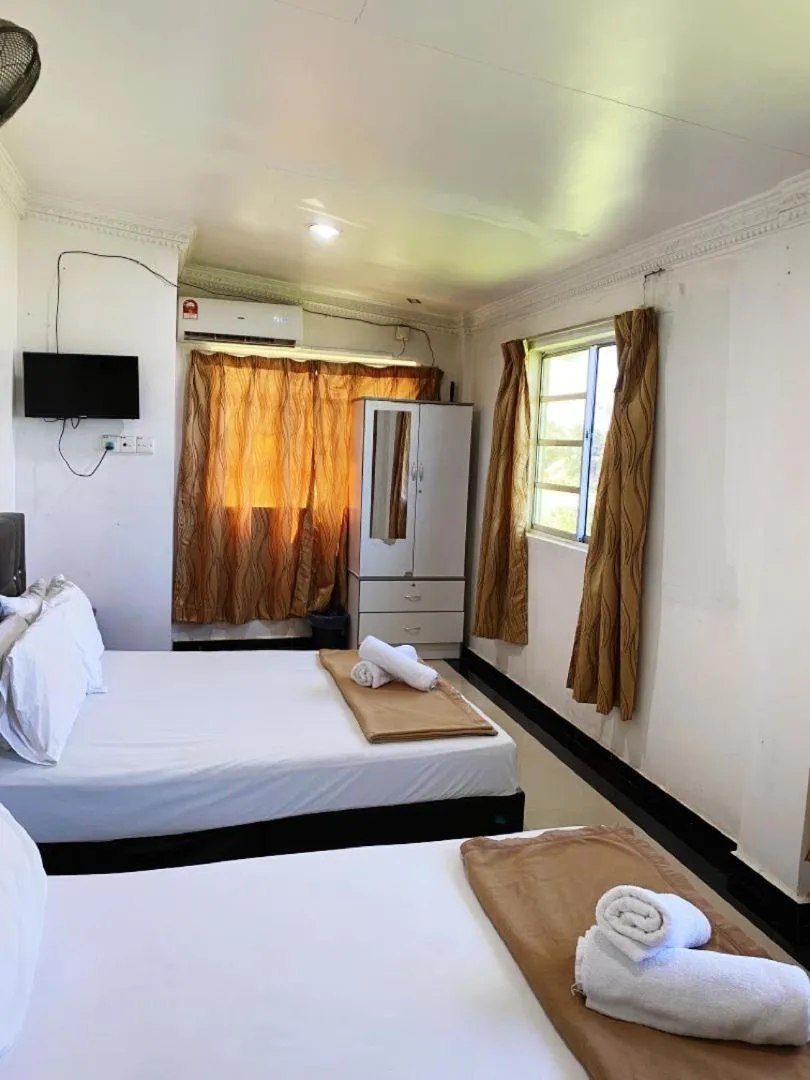 Bed in Raihan Beach Resort