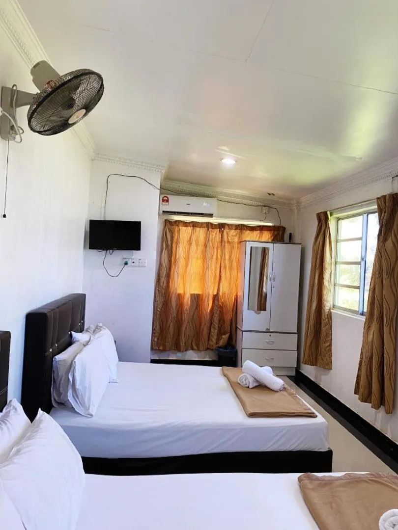 Bed in Raihan Beach Resort