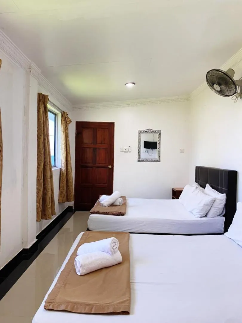 Bed in Raihan Beach Resort