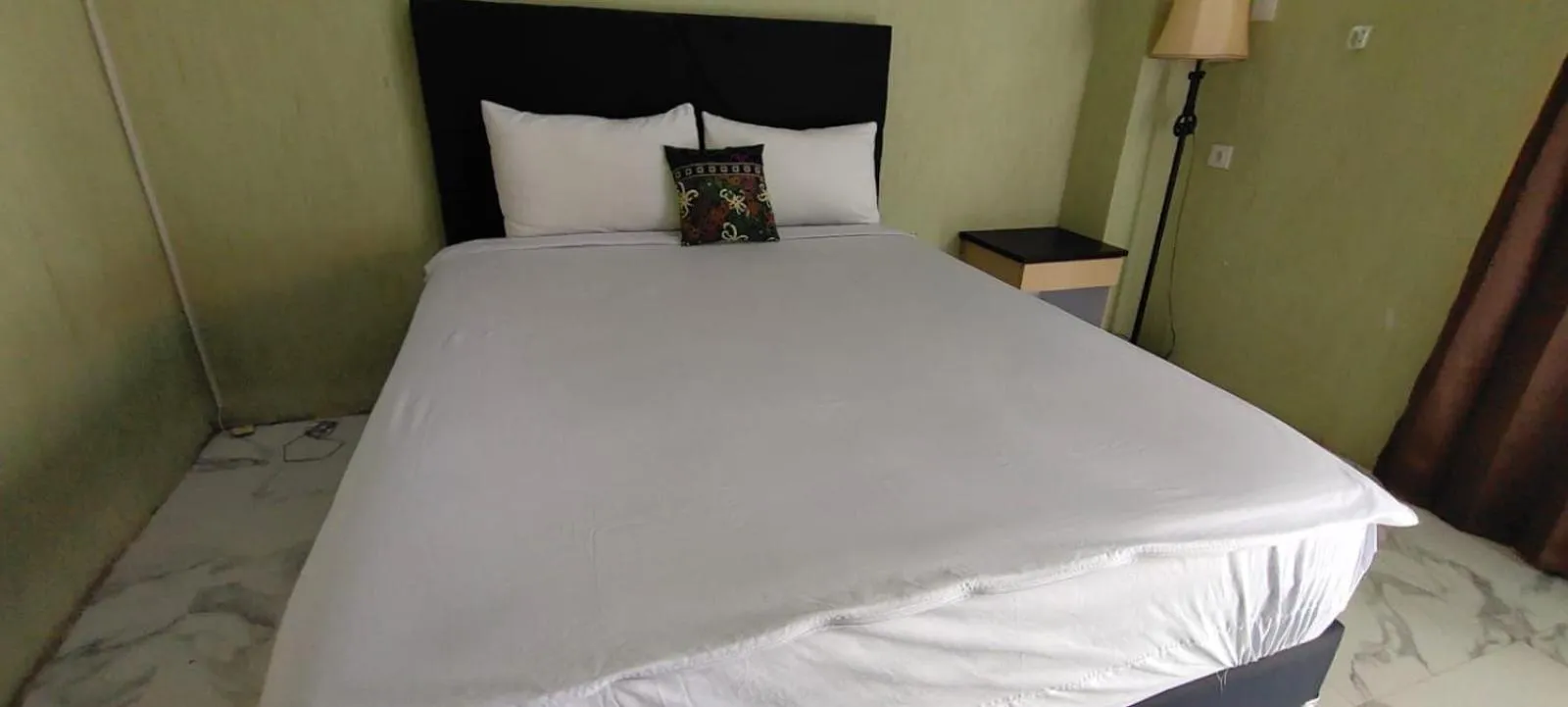 Bedroom in Hotel O Tris