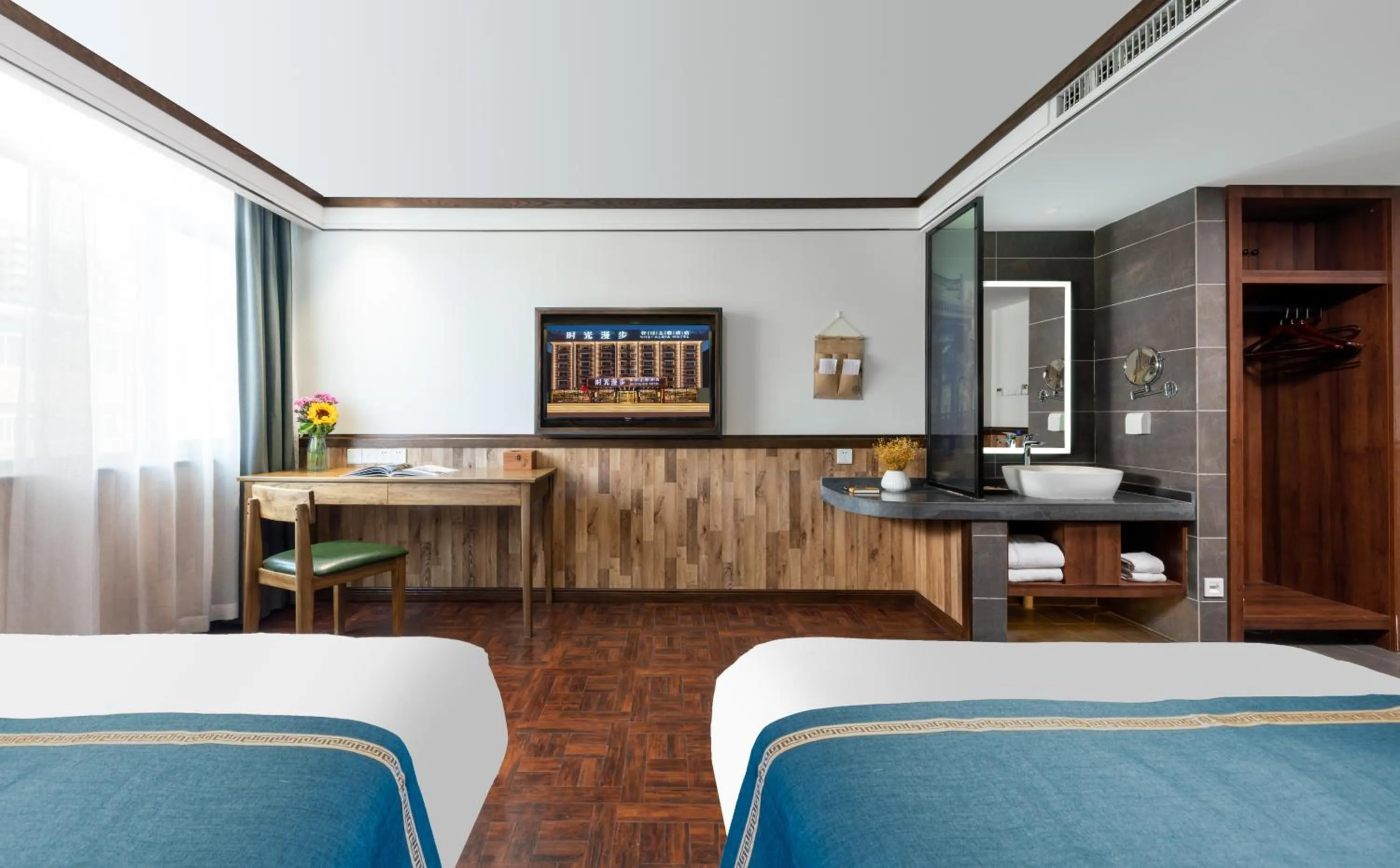 TV and multimedia in Nost algia Hotel Near University of Technology -Shanxi museum 时光漫步酒店 山西博物院太原理工大学店 Free fresh ground coffee,Free laundry service