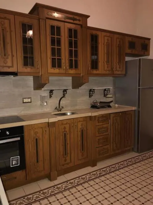 Kitchen or kitchenette in Aslan Residence