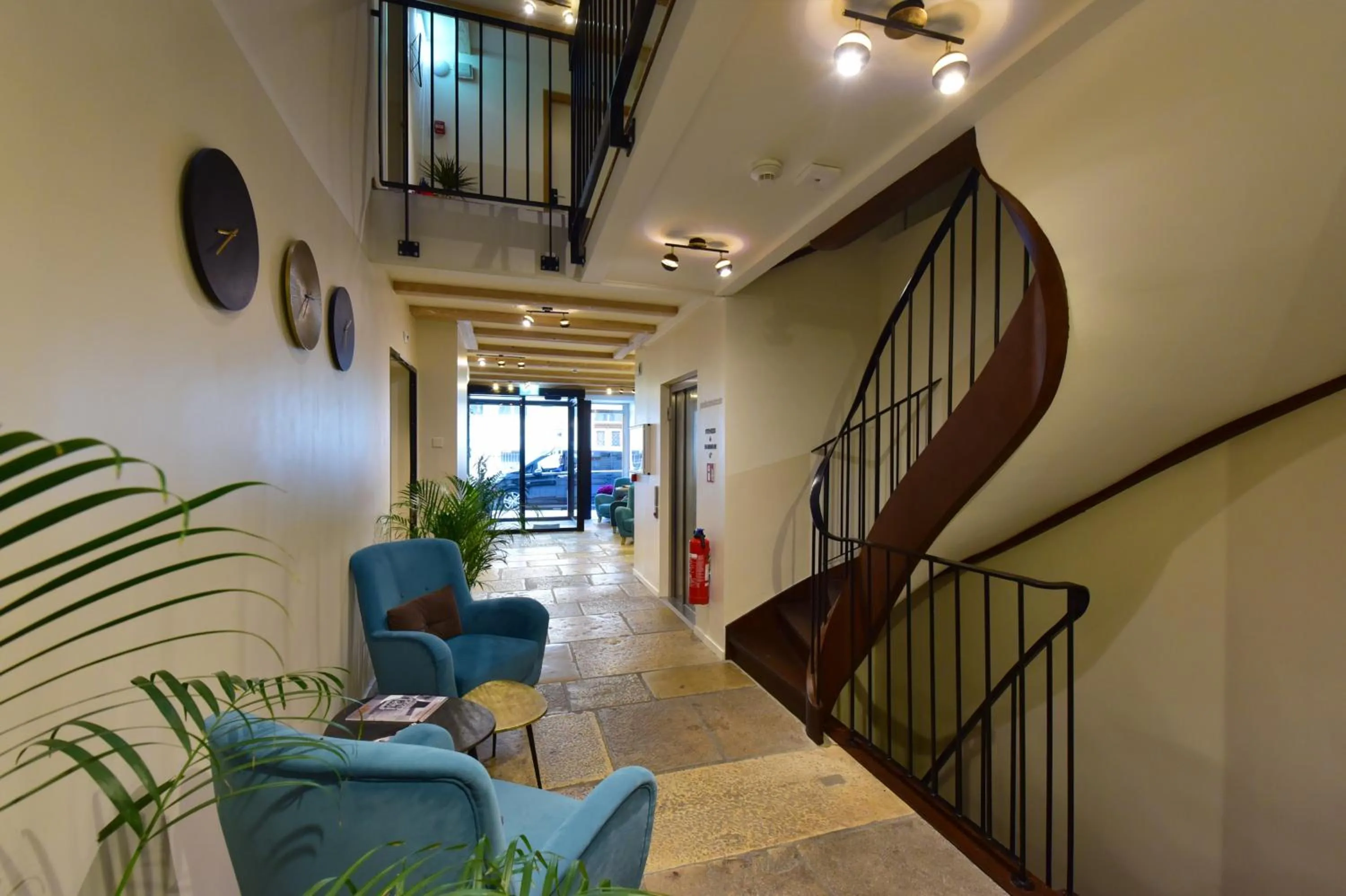 Lobby or reception in Hôtel Rousseau Plus