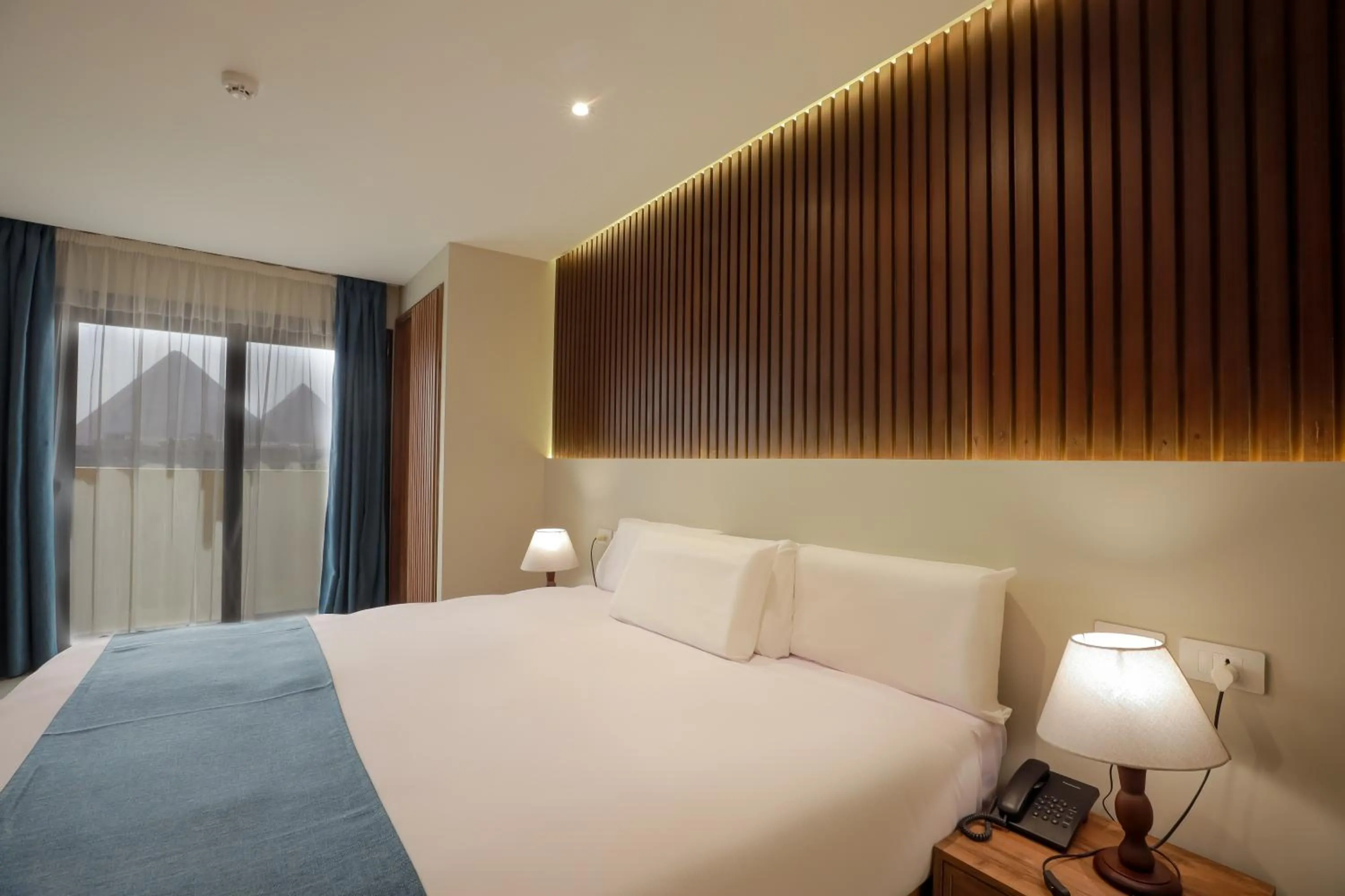 Bed in Pyramid Front Hotel