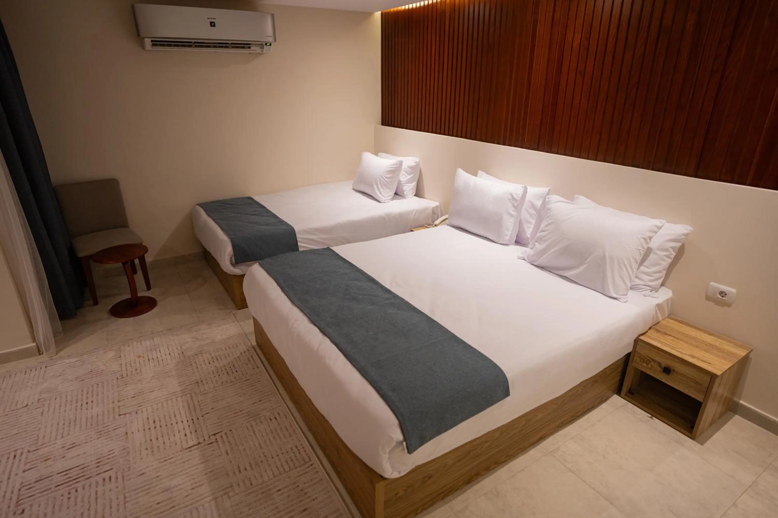 Photo of the whole room, Bed in Pyramid Front Hotel