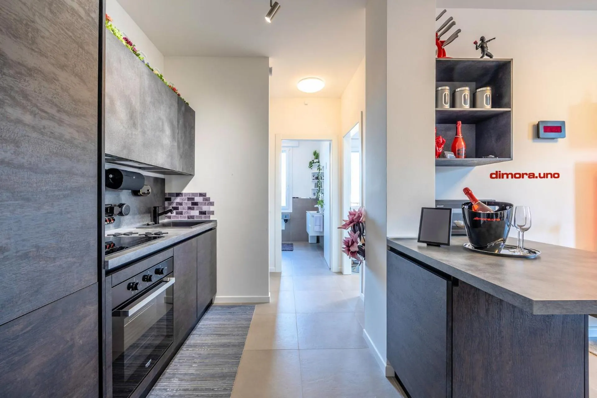 Kitchen or kitchenette in dimorauno - appartamento domotico a 5 stelle