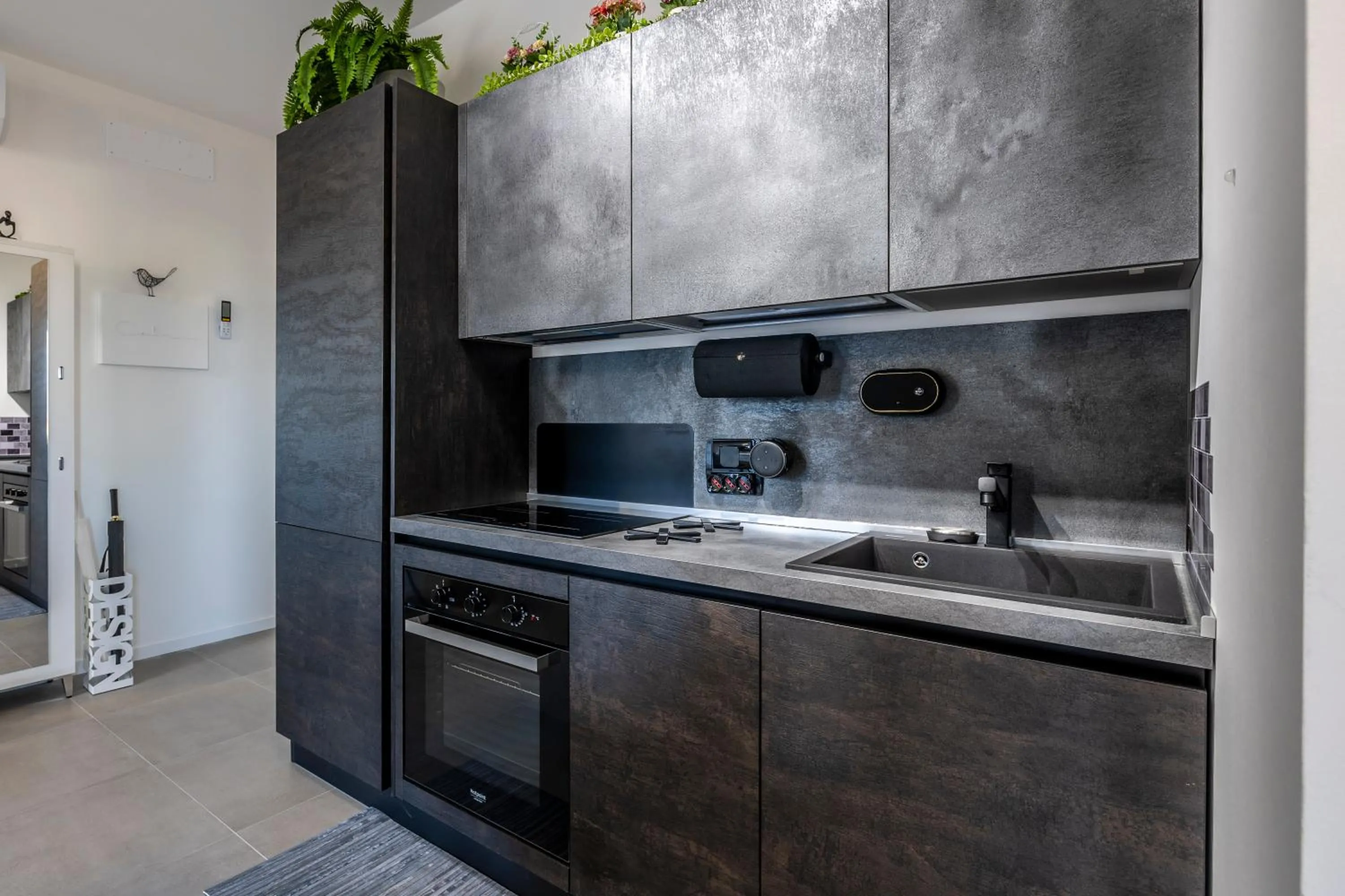 Kitchen or kitchenette in dimorauno - appartamento domotico a 5 stelle