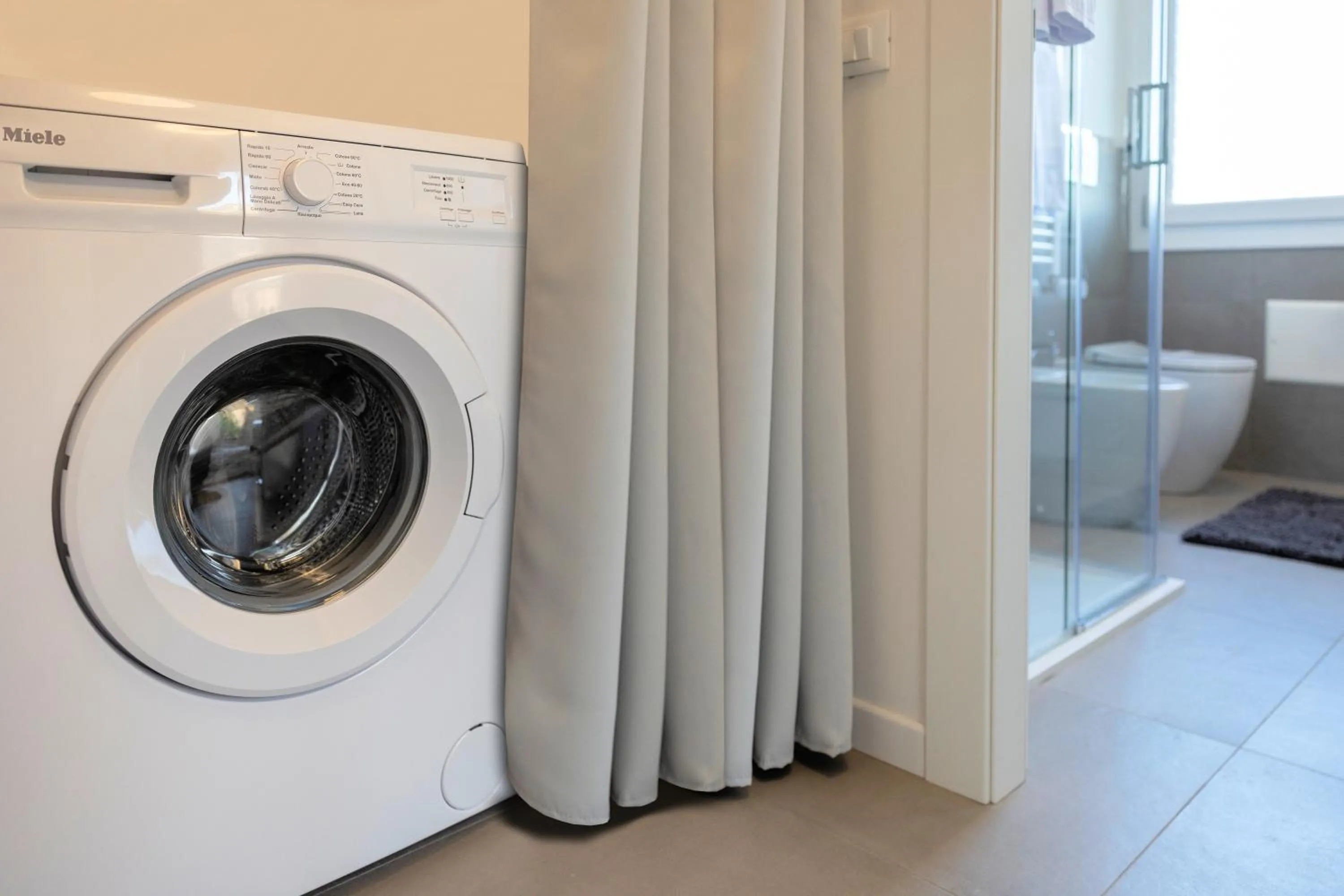 washing machine in dimorauno - appartamento domotico a 5 stelle