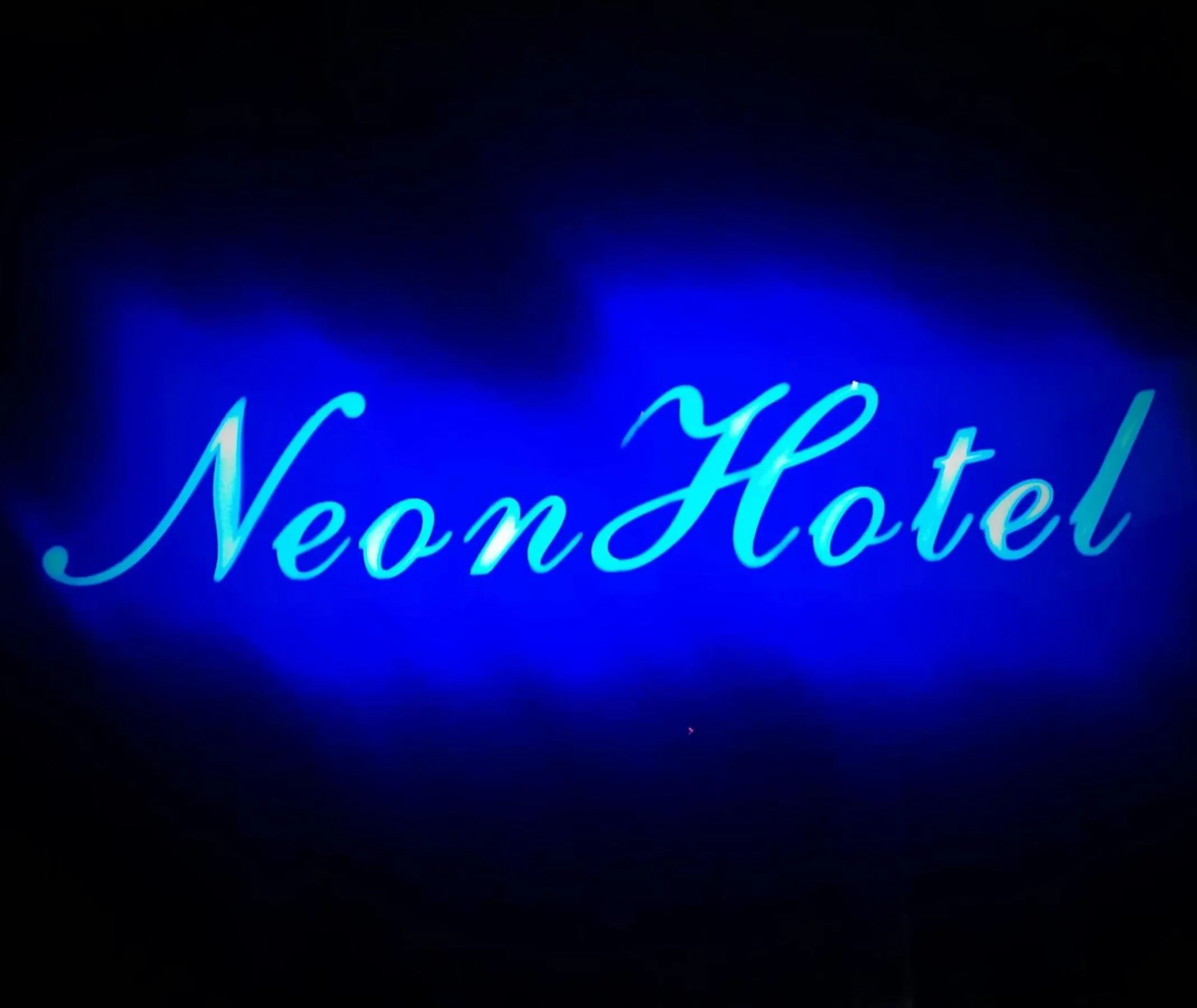 Property logo or sign in Neon Hotel