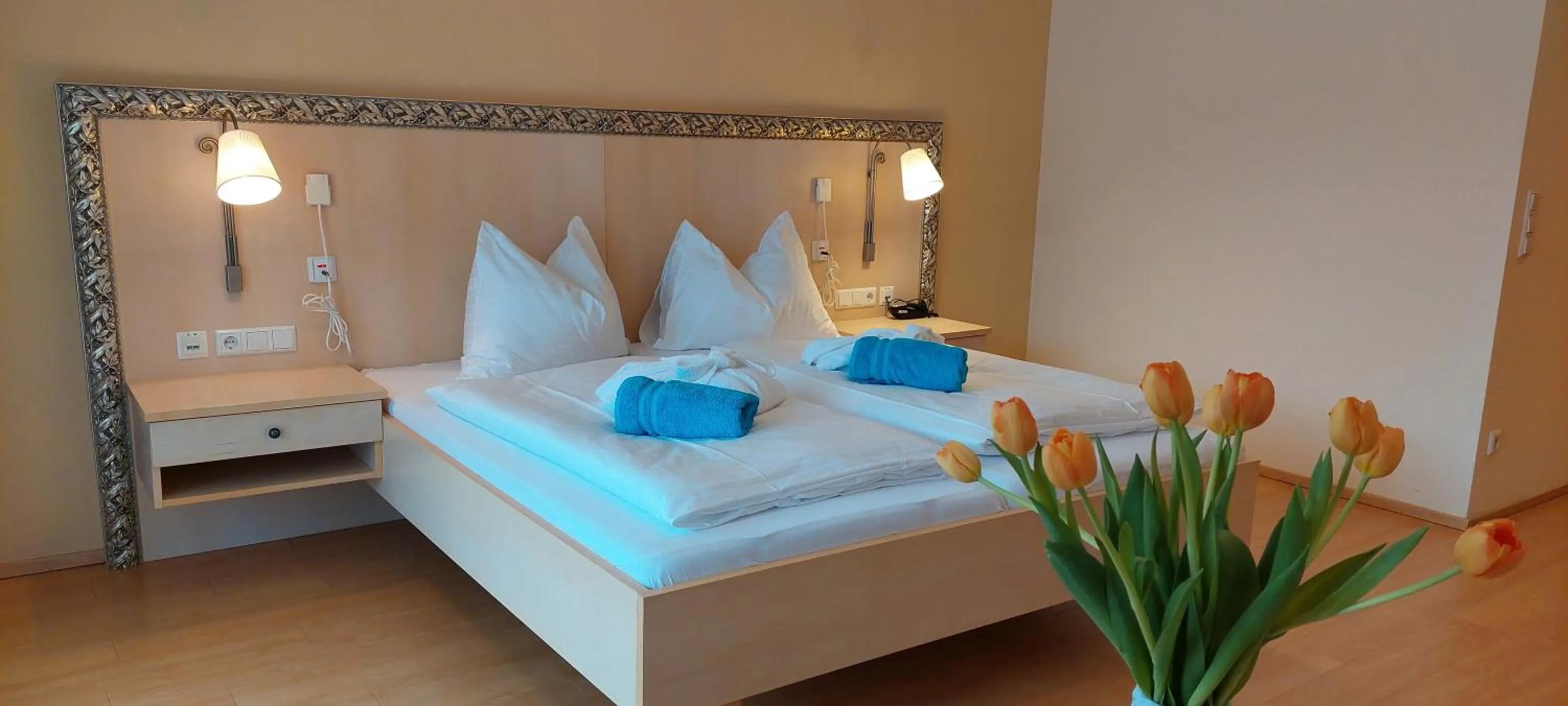 Photo of the whole room, Bed in Gesundheits- & Wellness Resort Weissenbach