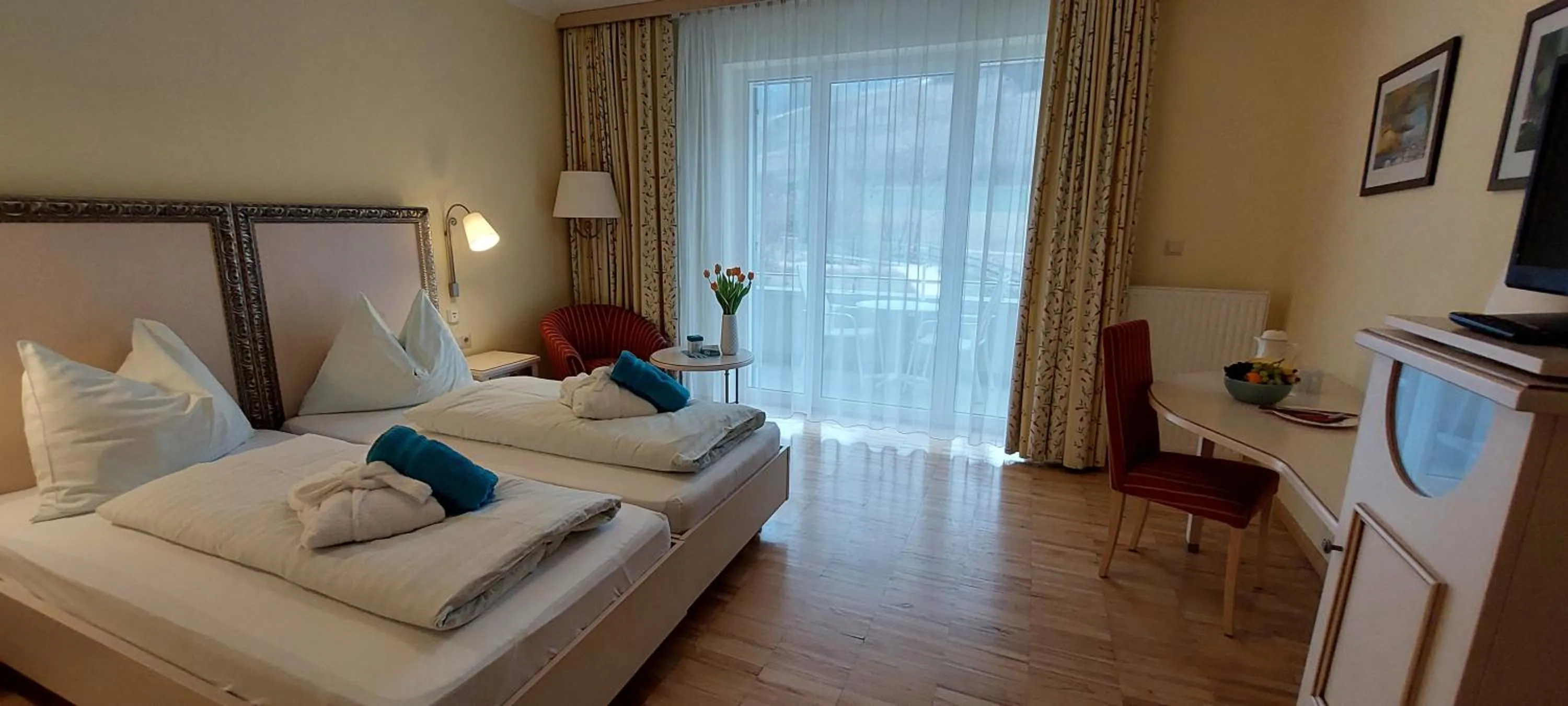 Photo of the whole room, Bed in Gesundheits- & Wellness Resort Weissenbach
