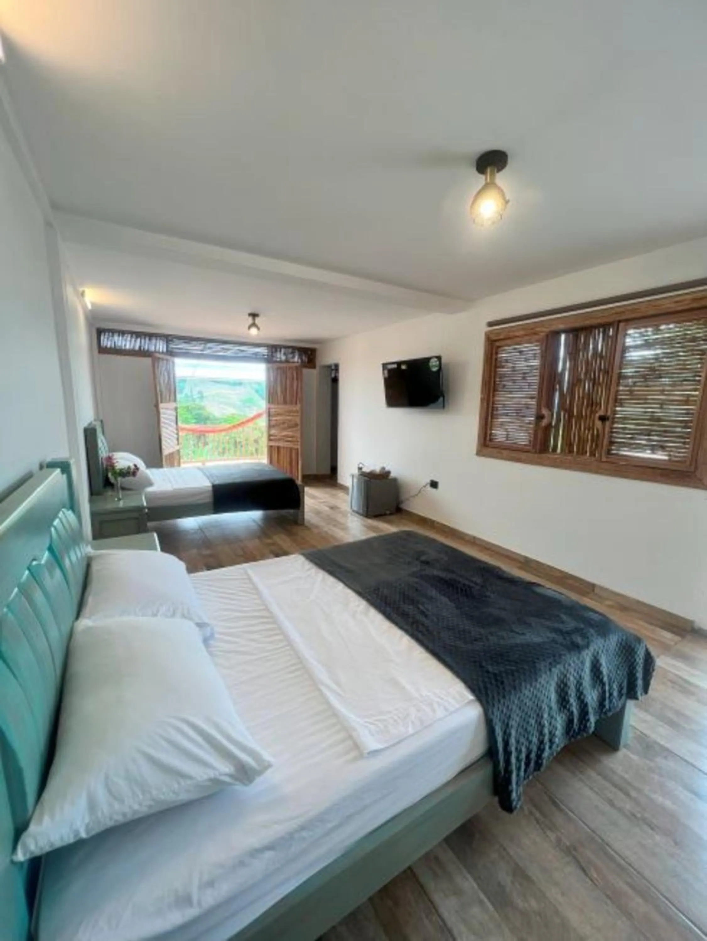 Bedroom, Bed in Hotel Hacienda San Isidro