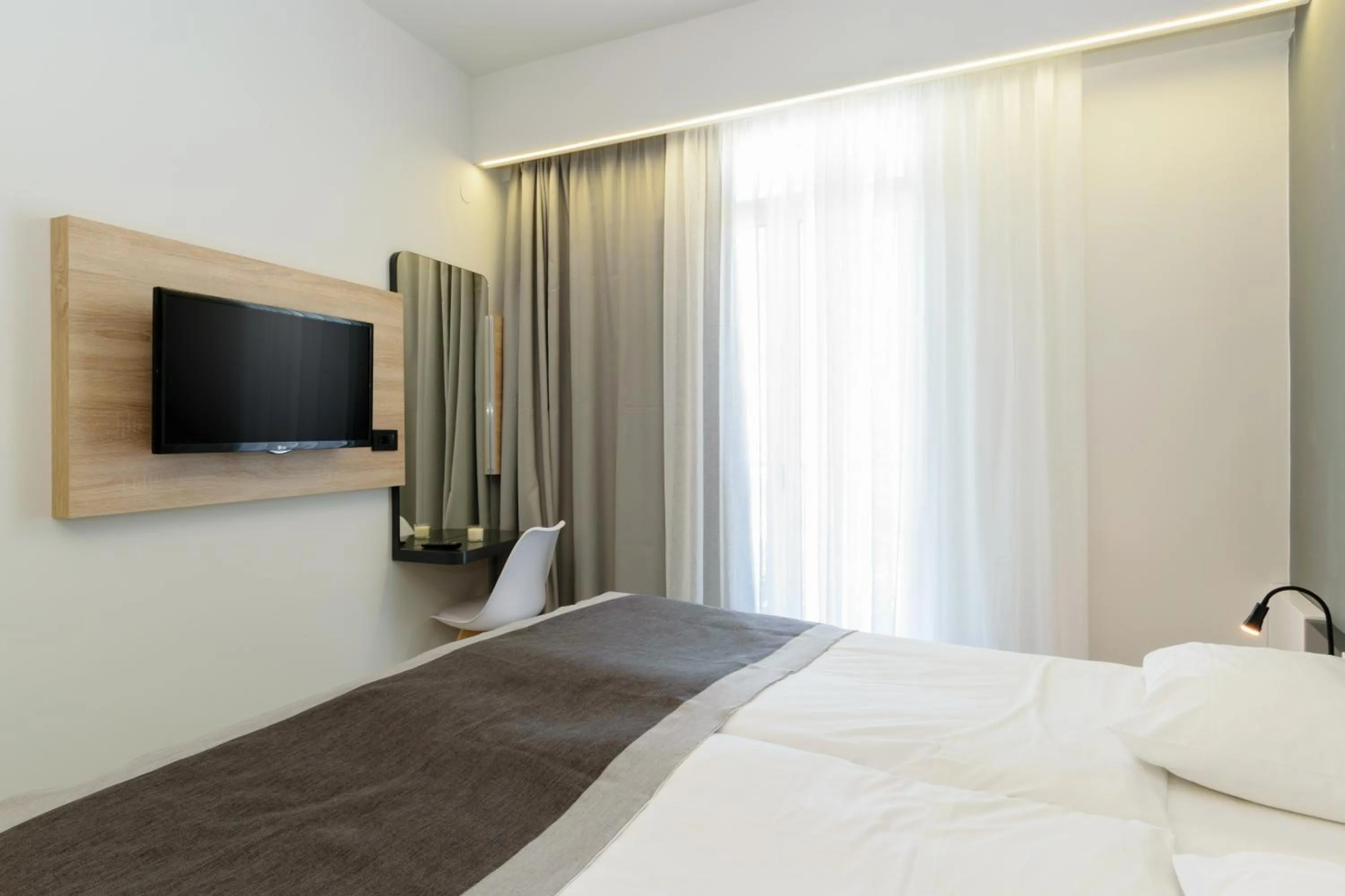 TV and multimedia, Bed in Renieris Hotel