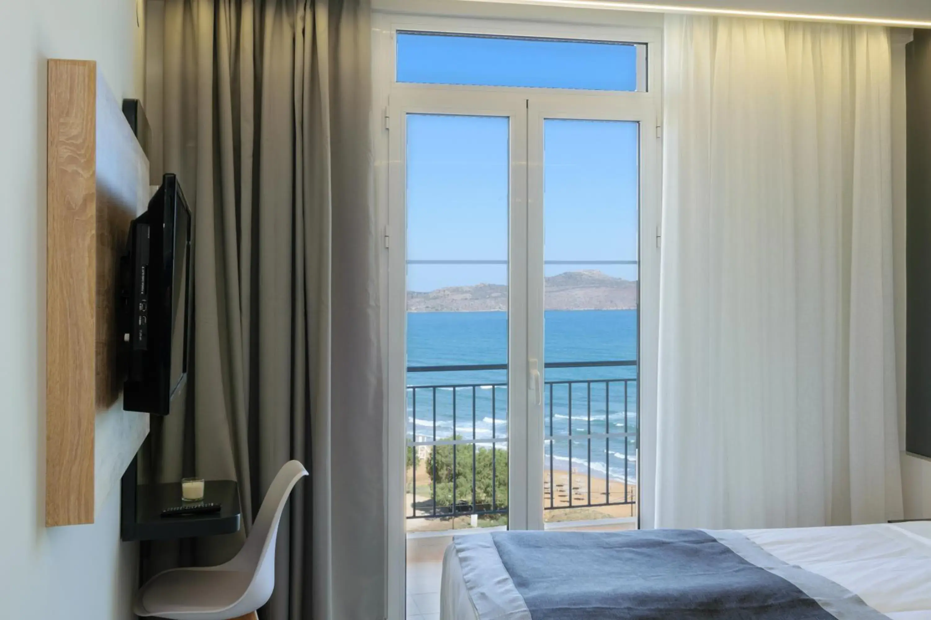 Twin Room - 2 adults & 1 child - Sea View in Renieris Hotel Twin Room - 2 adults & 1 child - Sea View in Renieris Hotel