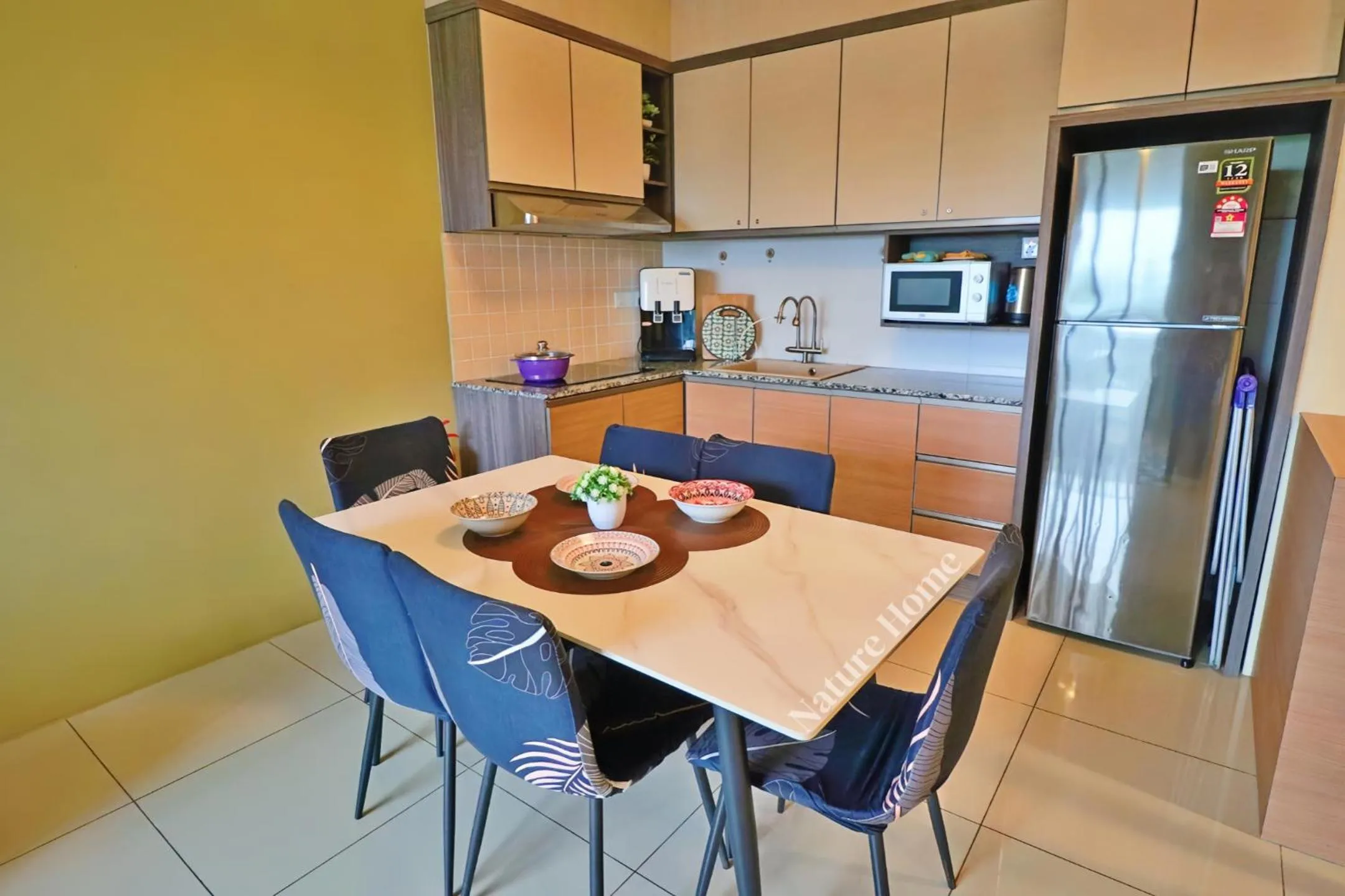 Kitchen or kitchenette in Nature Home - Swiss Garden Resort Residences