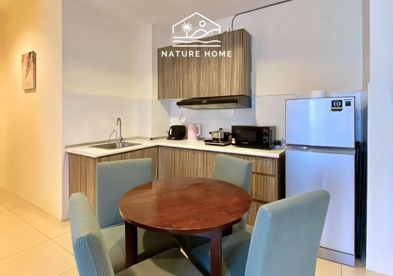 Kitchen or kitchenette in Nature Home - Swiss Garden Resort Residences - Weekend Free Breakfast