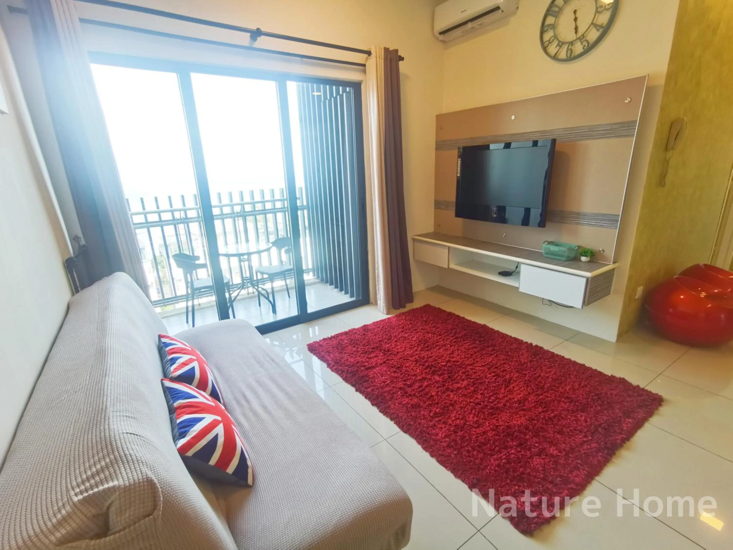 Communal lounge/ TV room in Nature Home - Swiss Garden Resort Residences