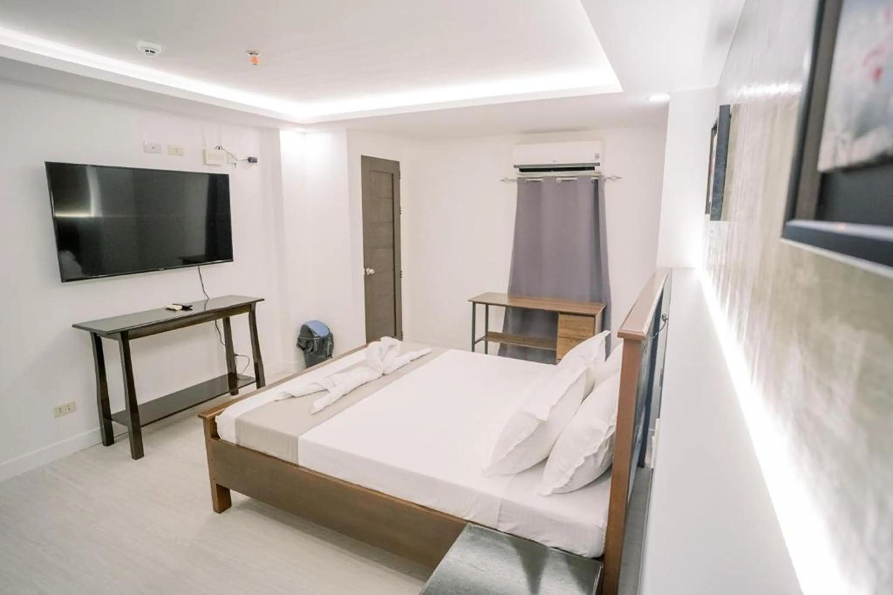 Bedroom in Spotlight Hotel near Hundred Islands Wharf