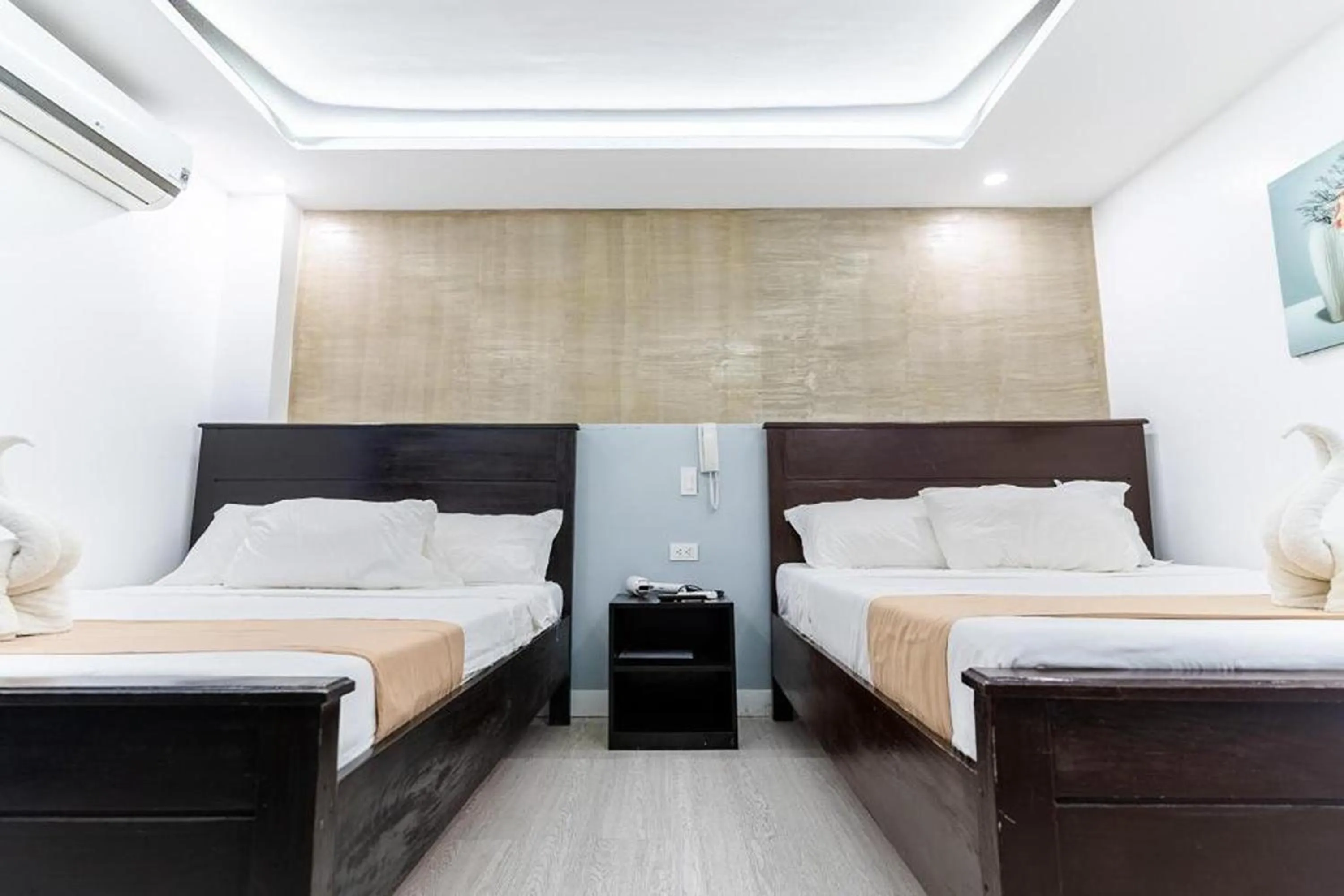 Bedroom in Spotlight Hotel near Hundred Islands Wharf