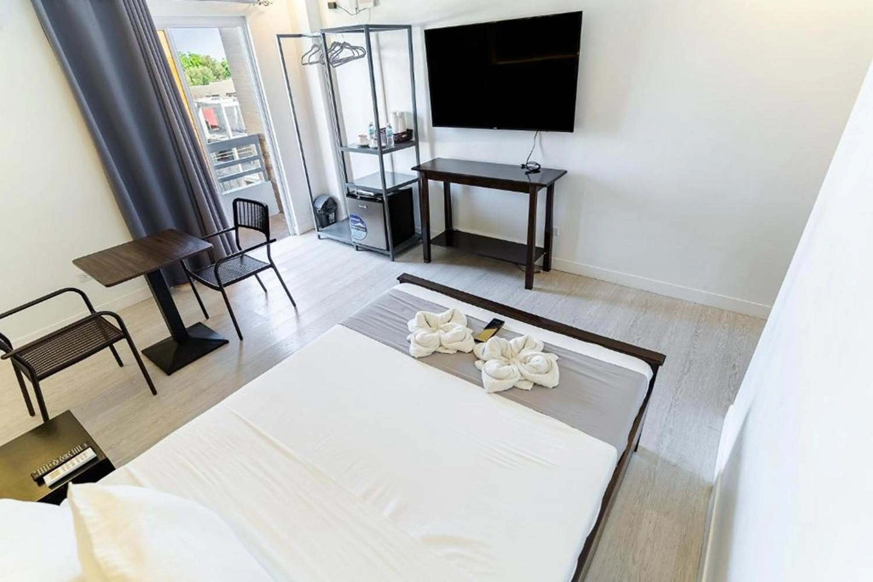 Bedroom in Spotlight Hotel near Hundred Islands Wharf