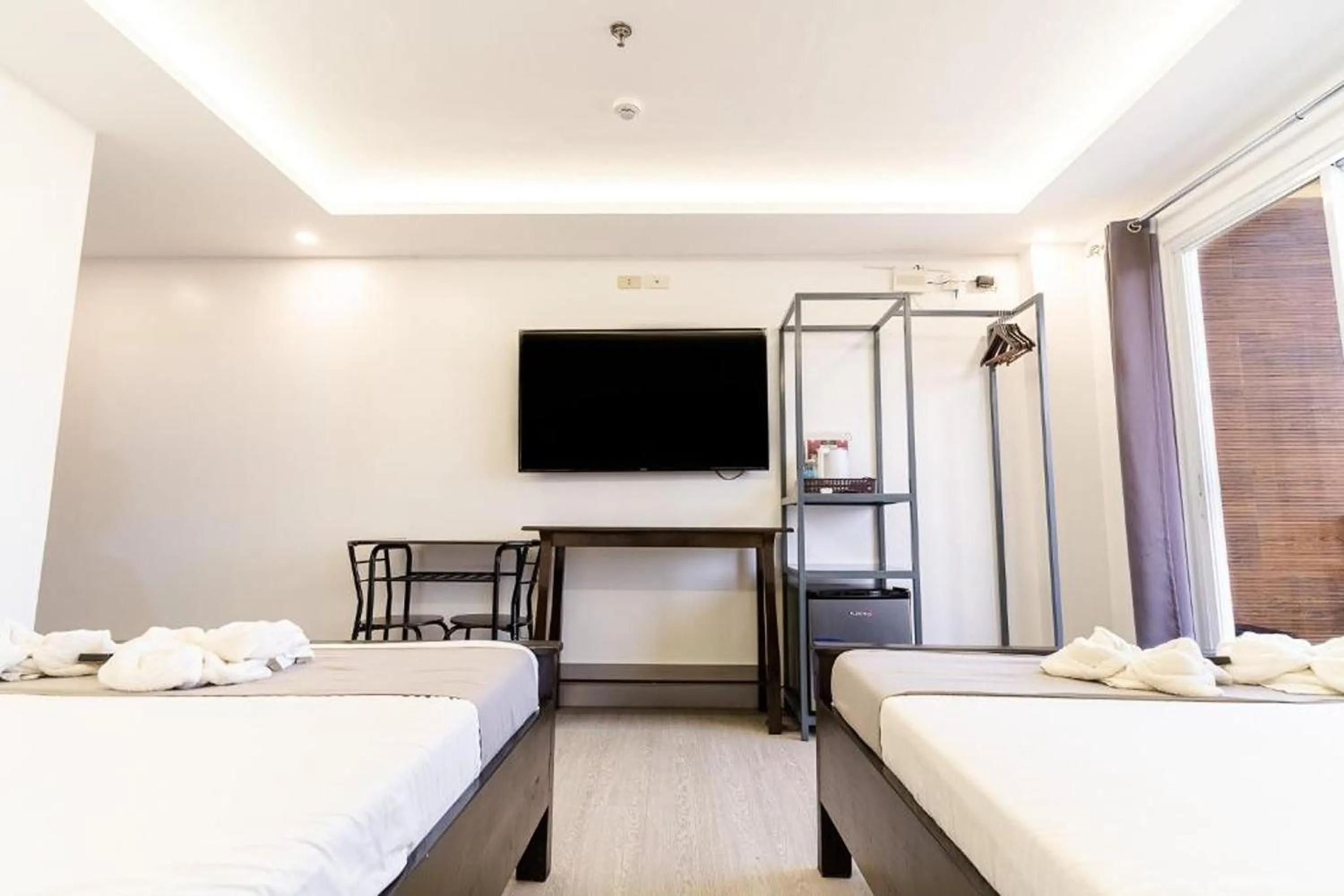 Bedroom in Spotlight Hotel near Hundred Islands Wharf