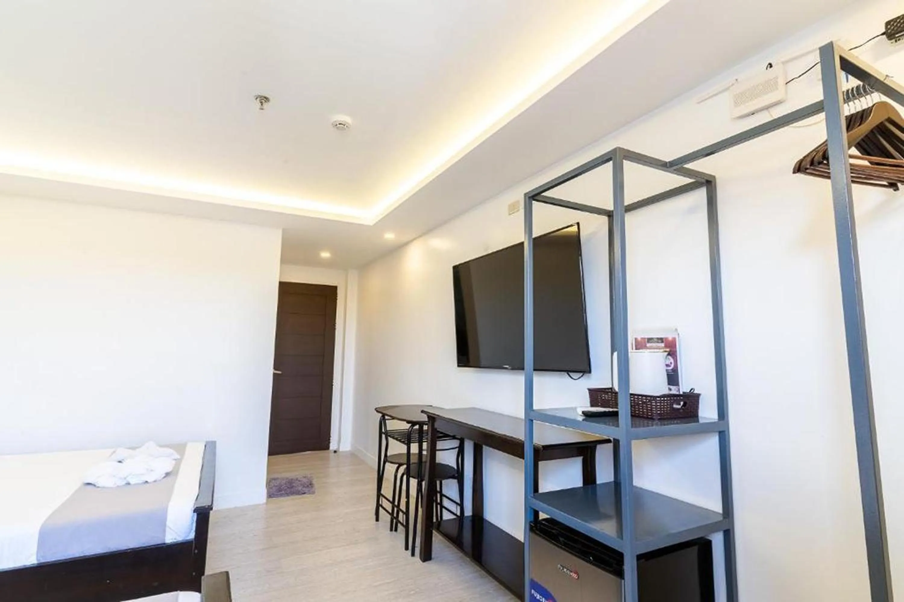 Bedroom in Spotlight Hotel near Hundred Islands Wharf