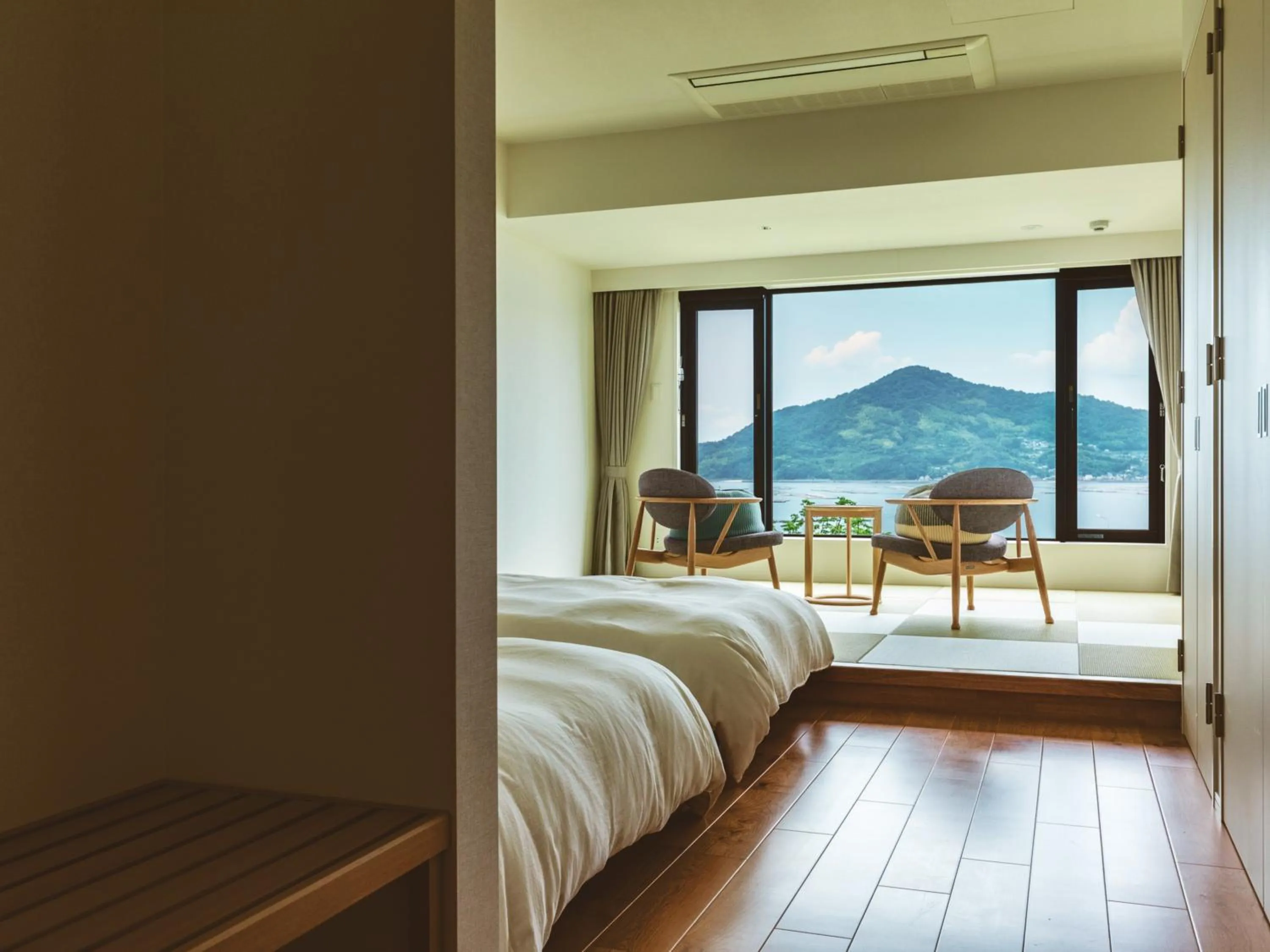 Photo of the whole room, Bed in Etajimasou Hotel & SPA Hiroshima