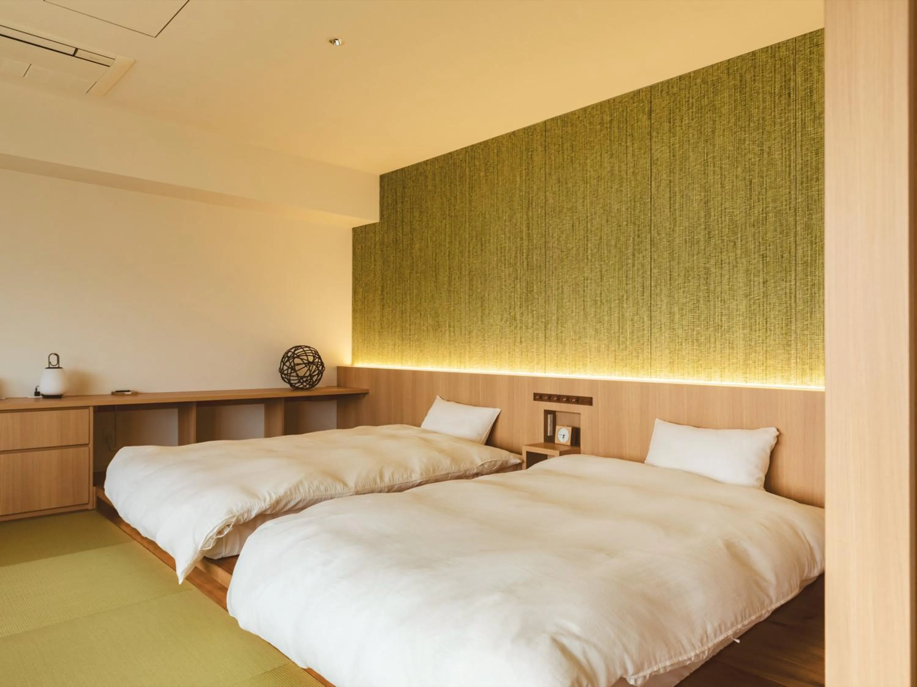 Photo of the whole room, Bed in Etajimasou Hotel & SPA Hiroshima