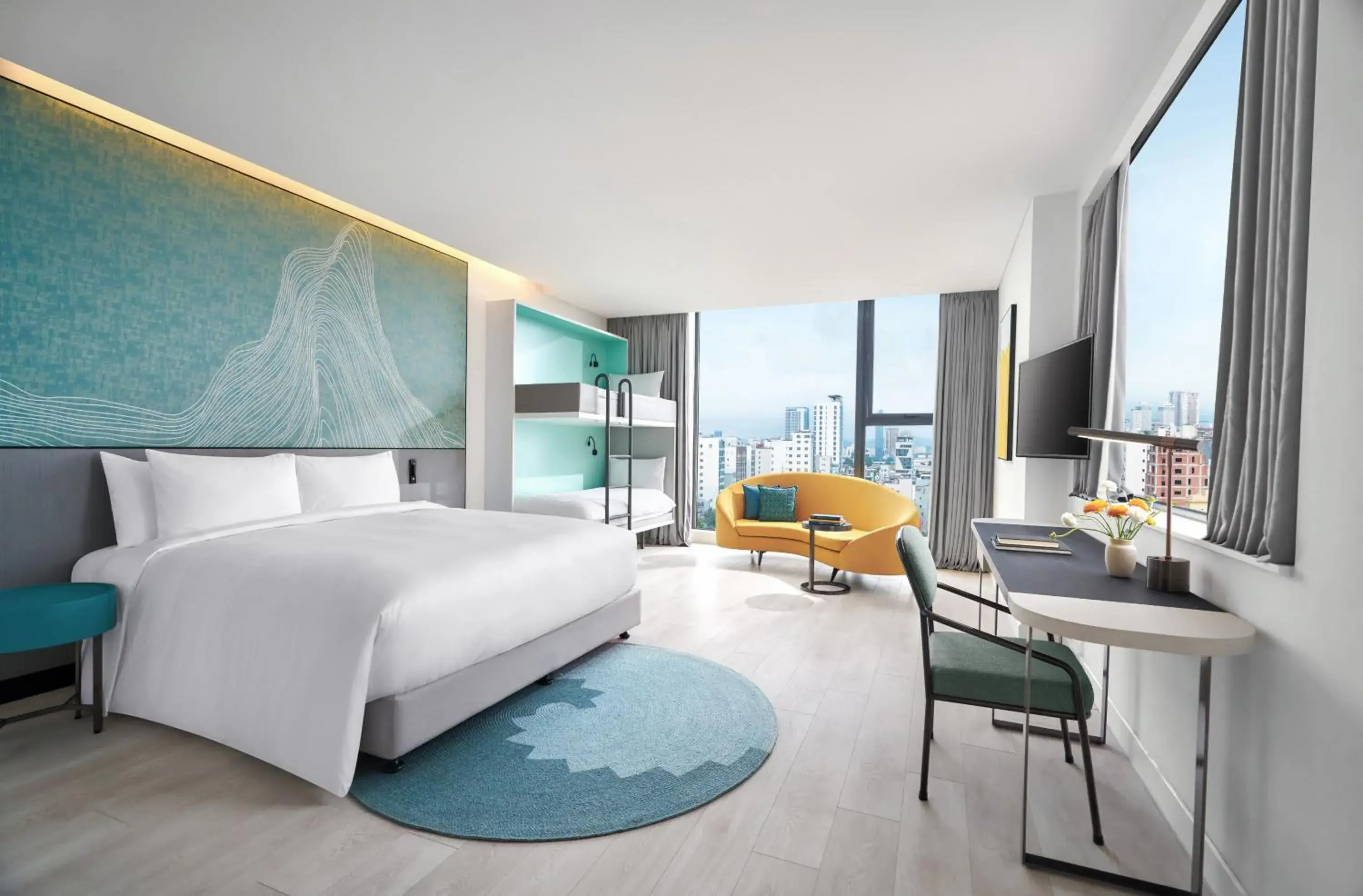 Family City View with One King and One Bunk Bed in voco Ma Belle Danang by IHG Family City View with One King and One Bunk Bed in voco Ma Belle Danang by IHG