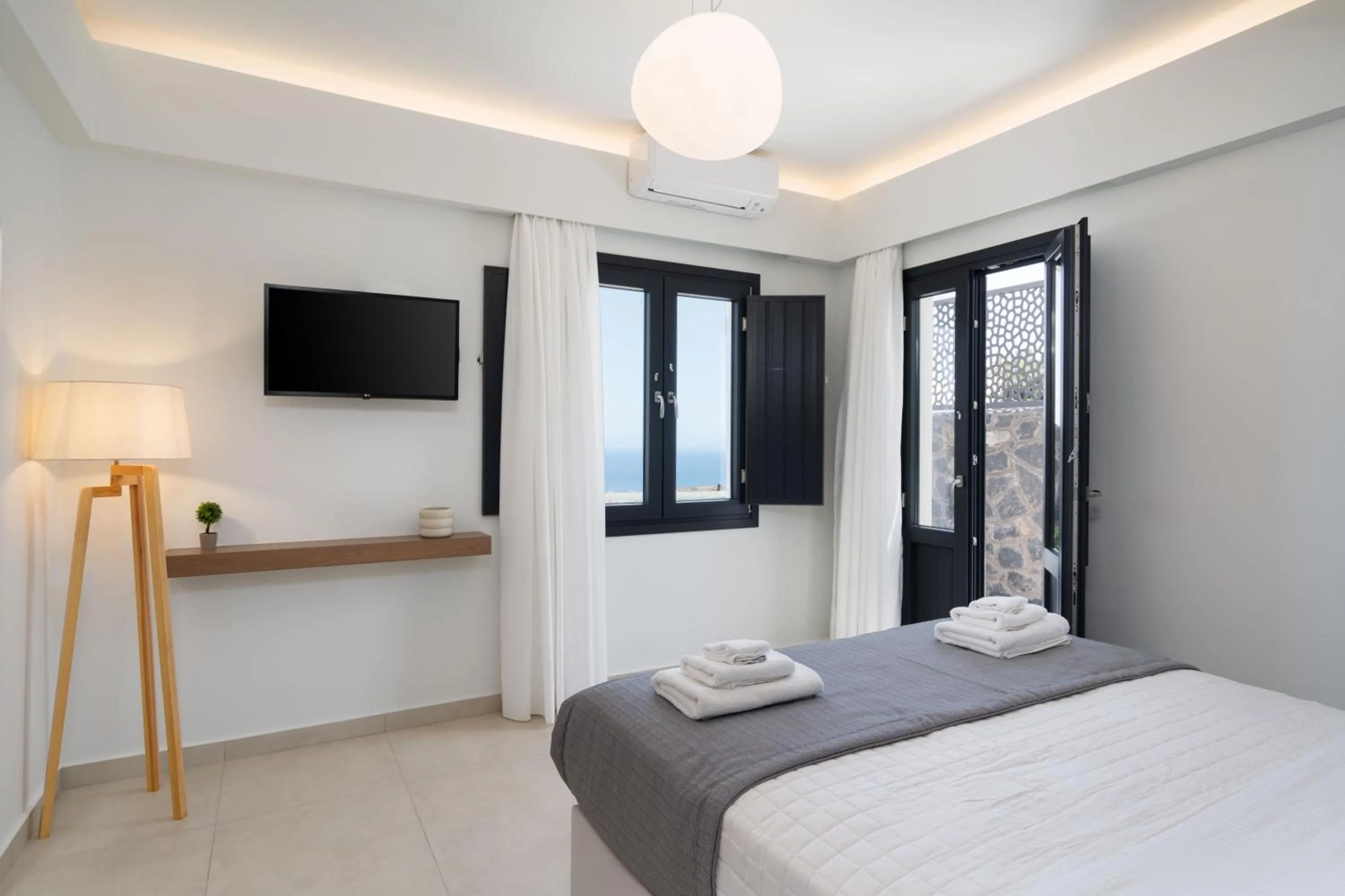 Bed in Cuore Santo Suites