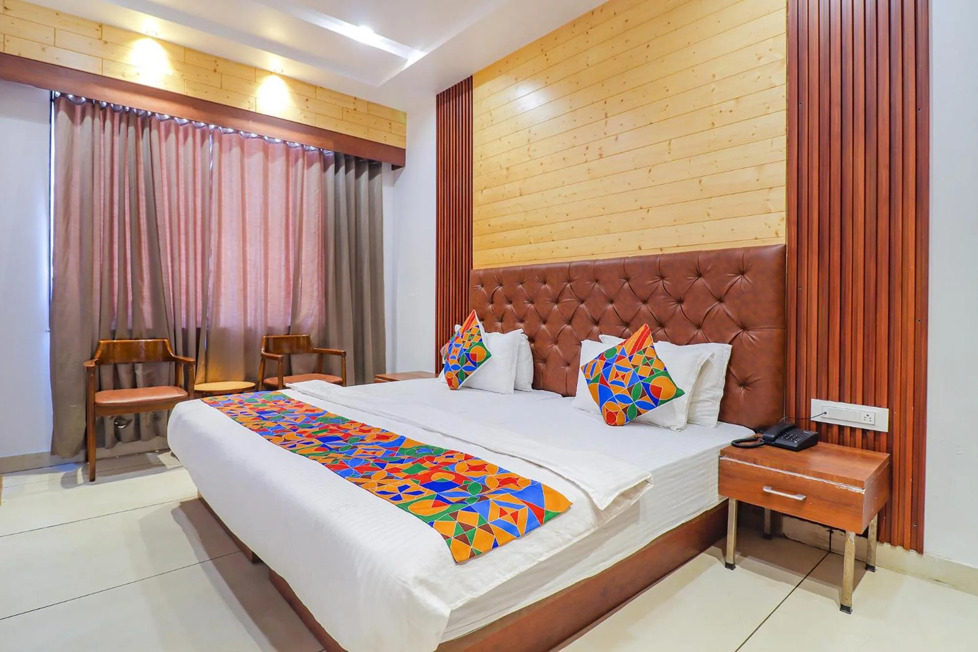 Bed in FabHotel Grand Arya
