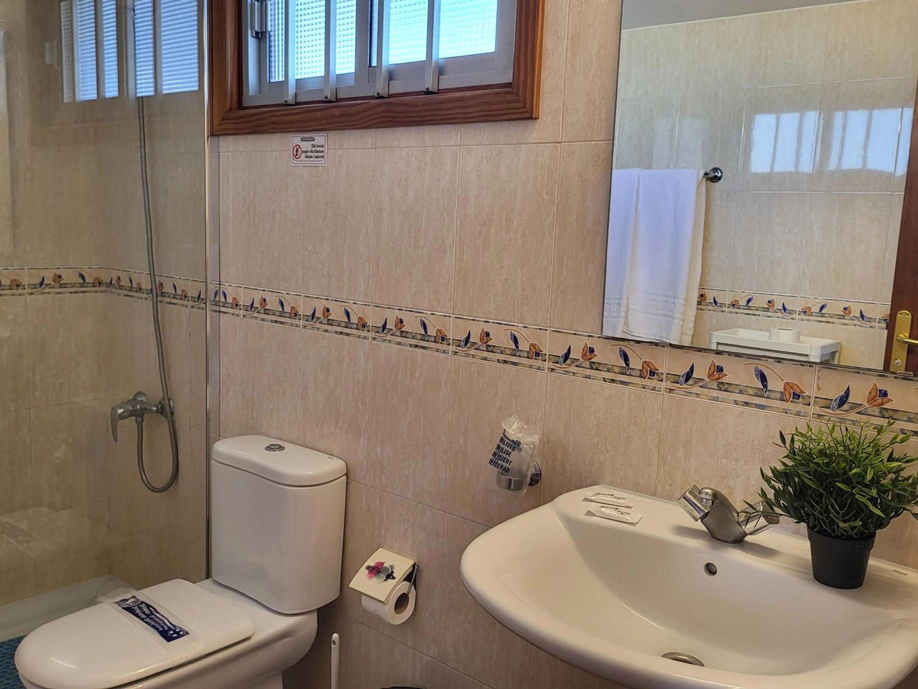 Bathroom in Las Camelias Apartments