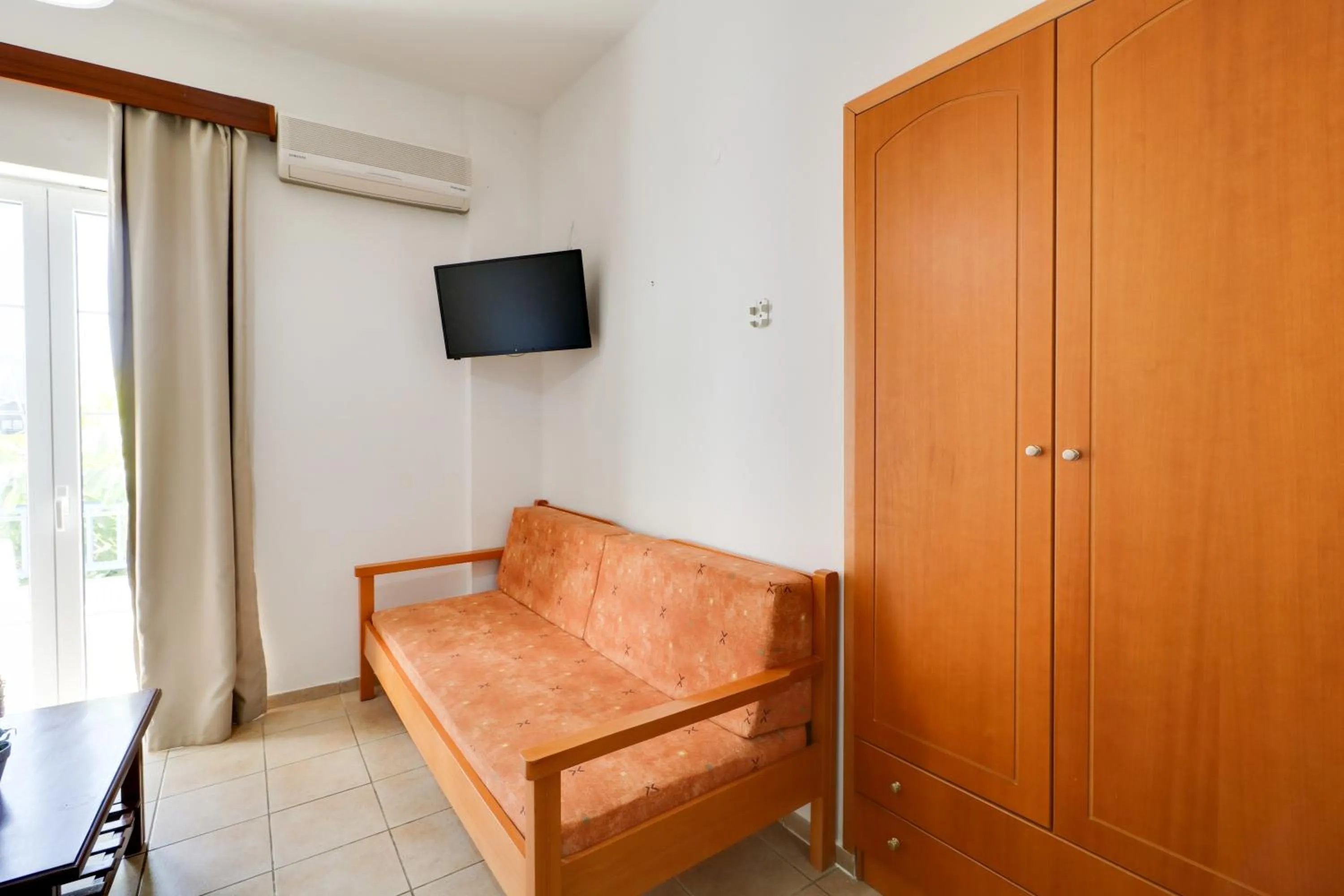 Seating area in Marirena Hotel