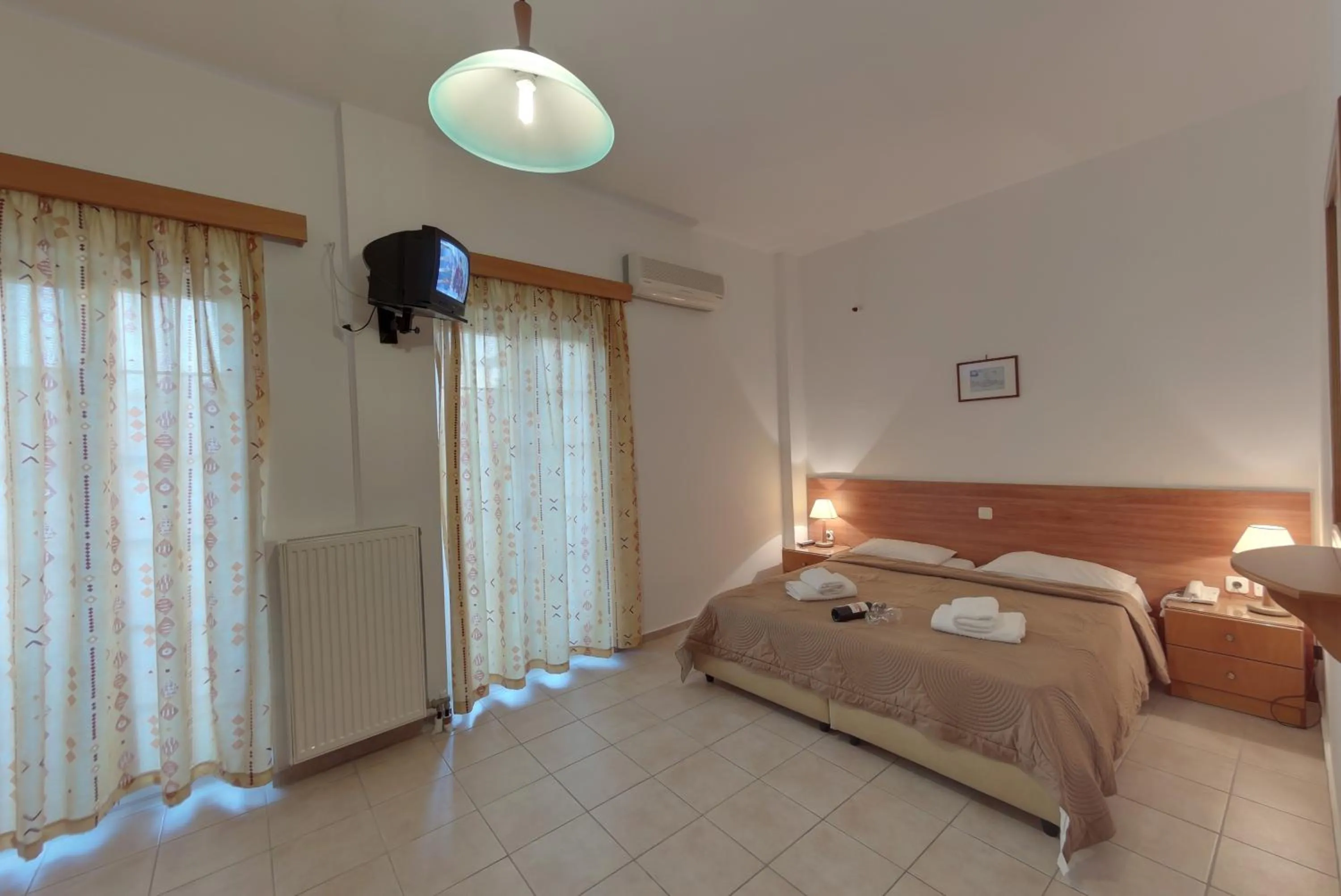 Bed in Marirena Hotel