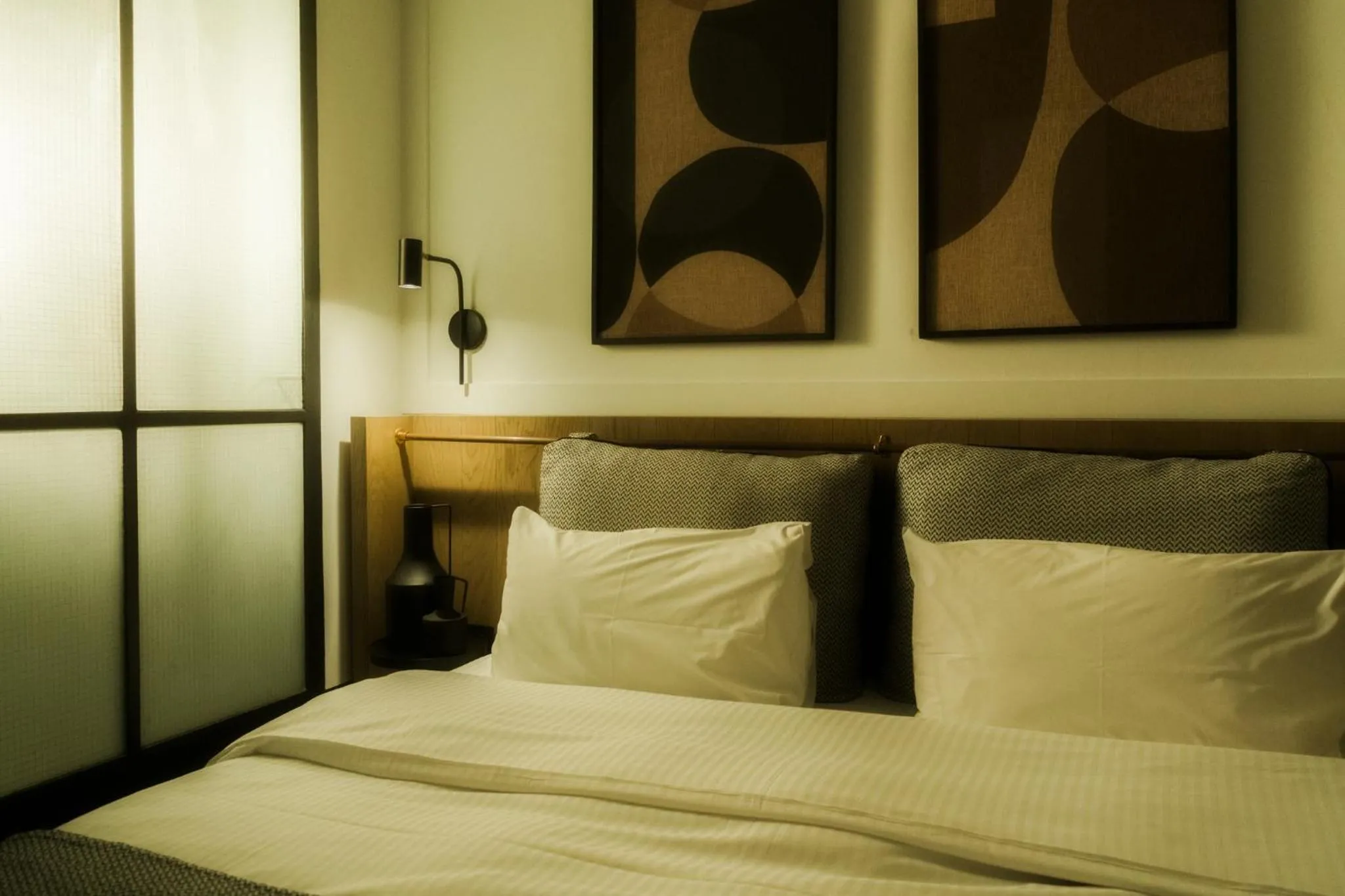 Bed in Niki Athens Hotel