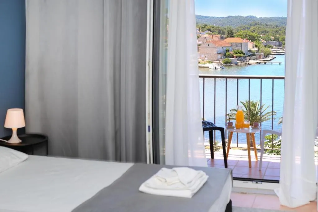 Bed in Hotel Lumbarda