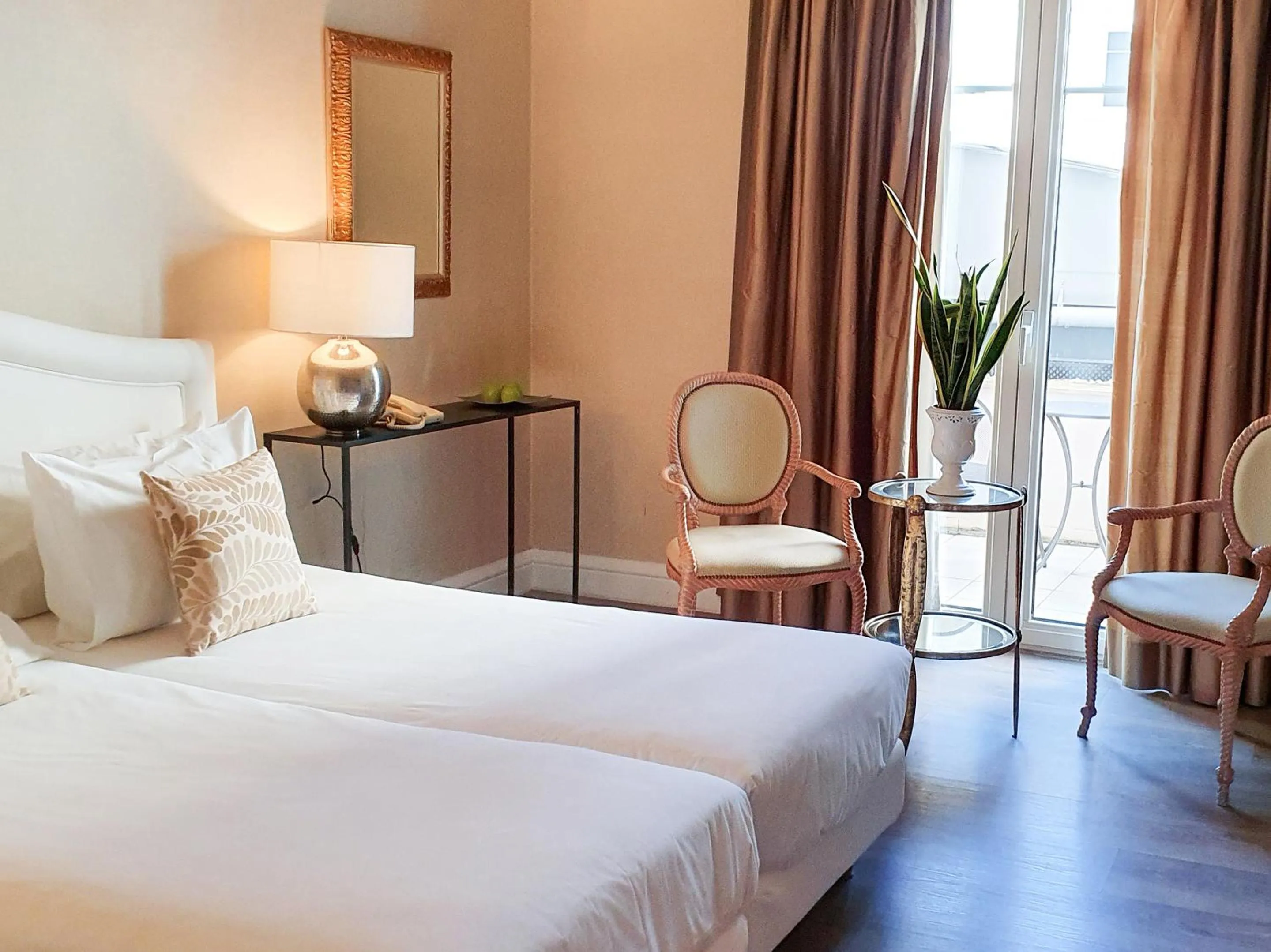 Bed in Grecotel Larissa Imperial