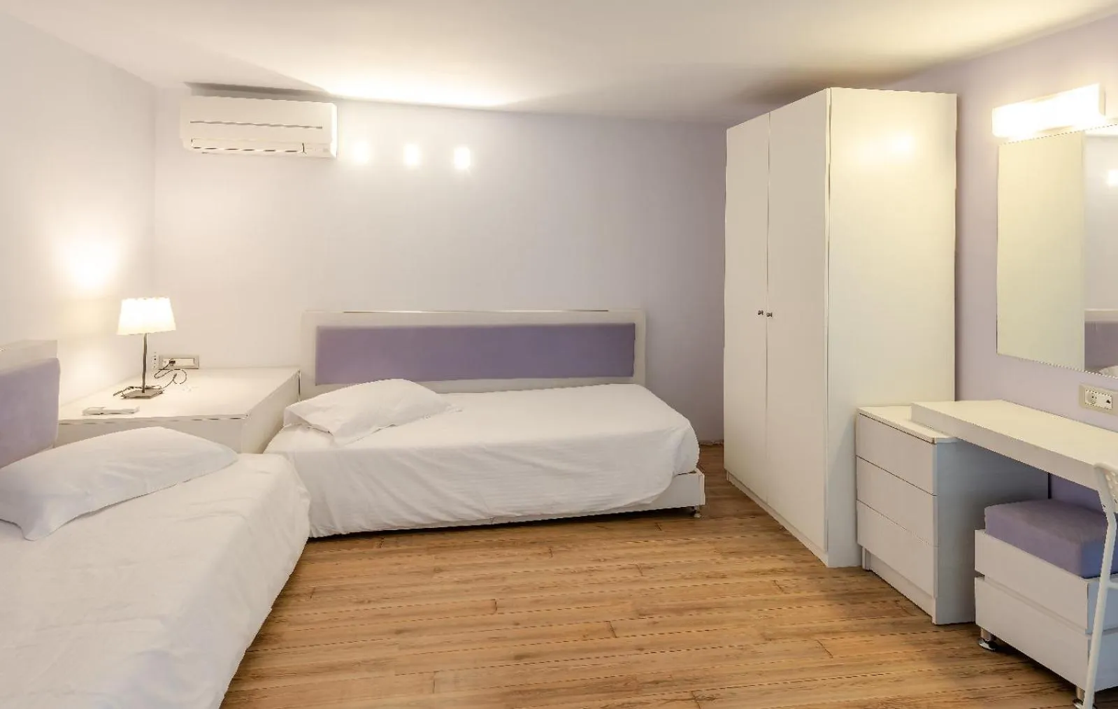 Bed in Triton Boutique Hotel