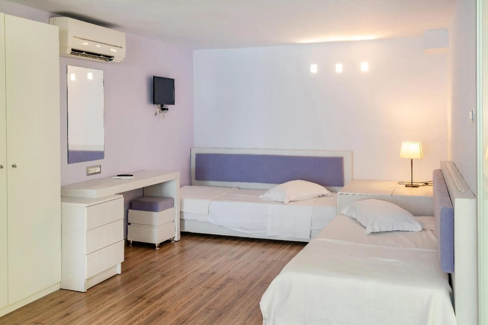 Bed in Triton Boutique Hotel