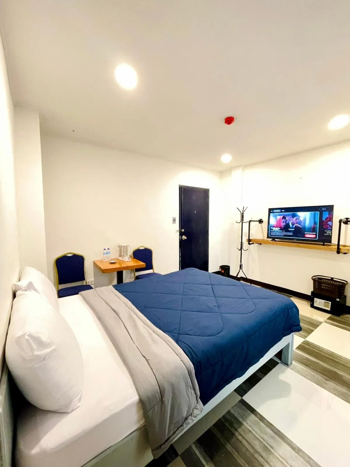 Bed in Bluewing Hotel Angeles powered by Cocotel