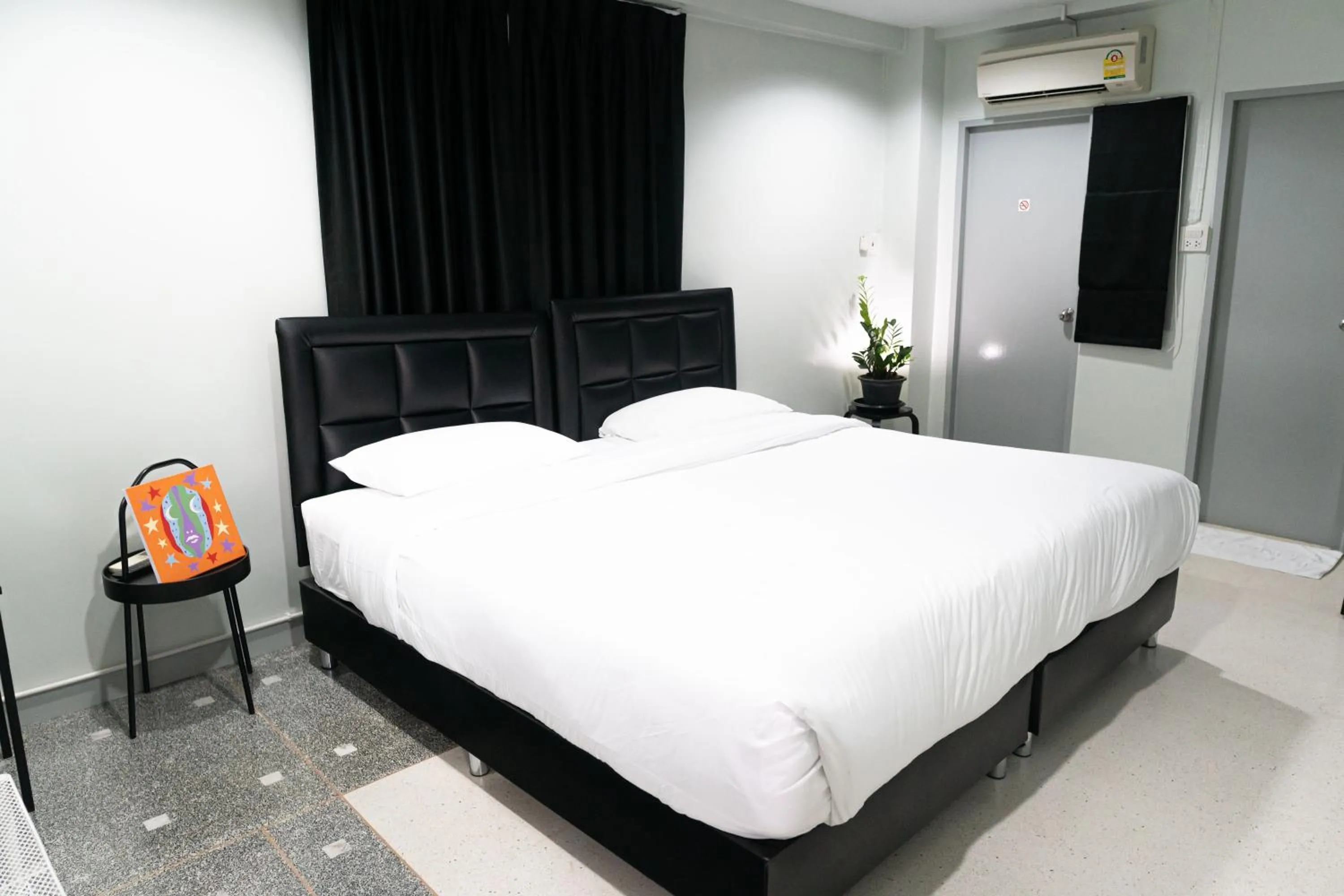 Bed in Suksomboon Residence