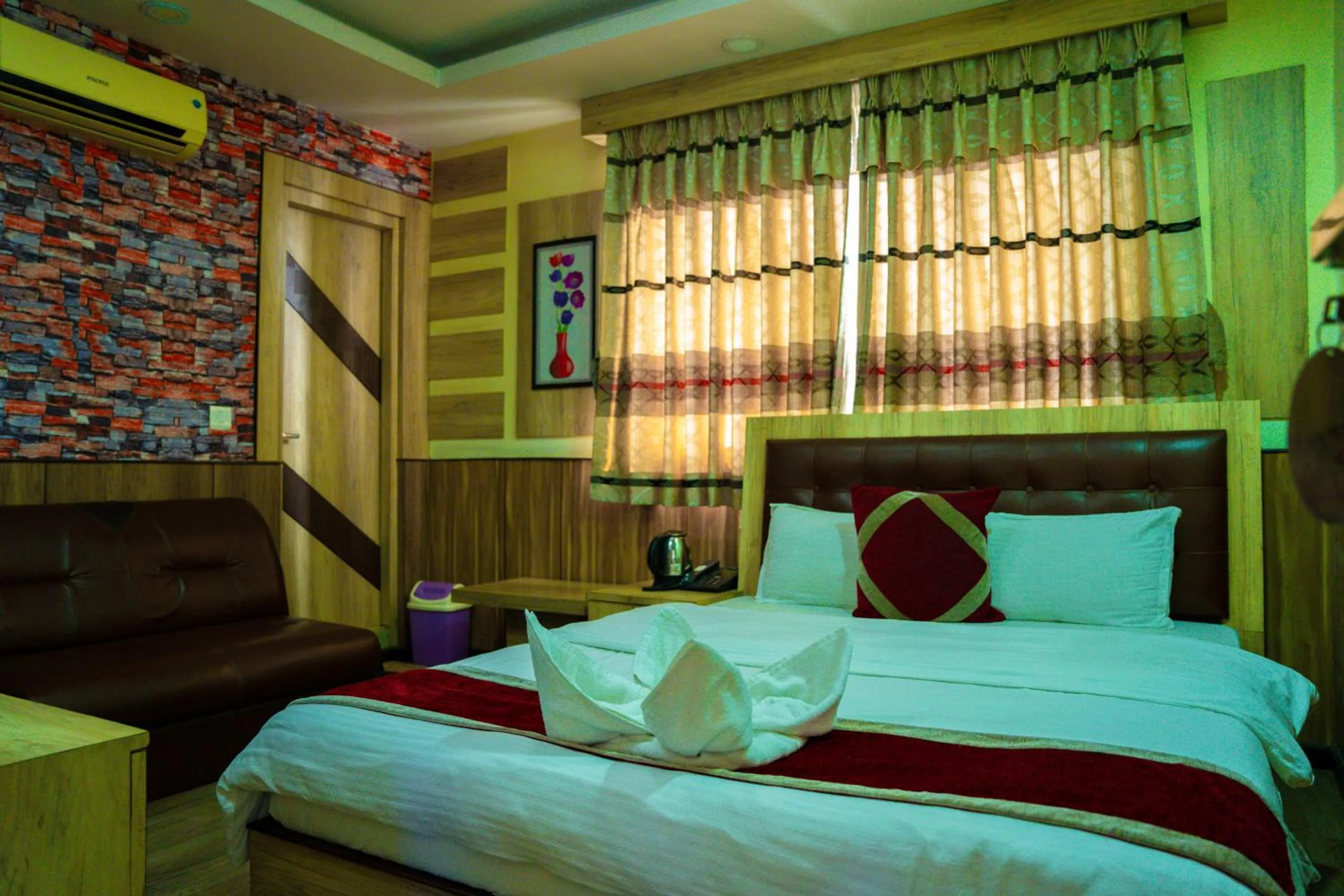 Bed in Gautam Hotel