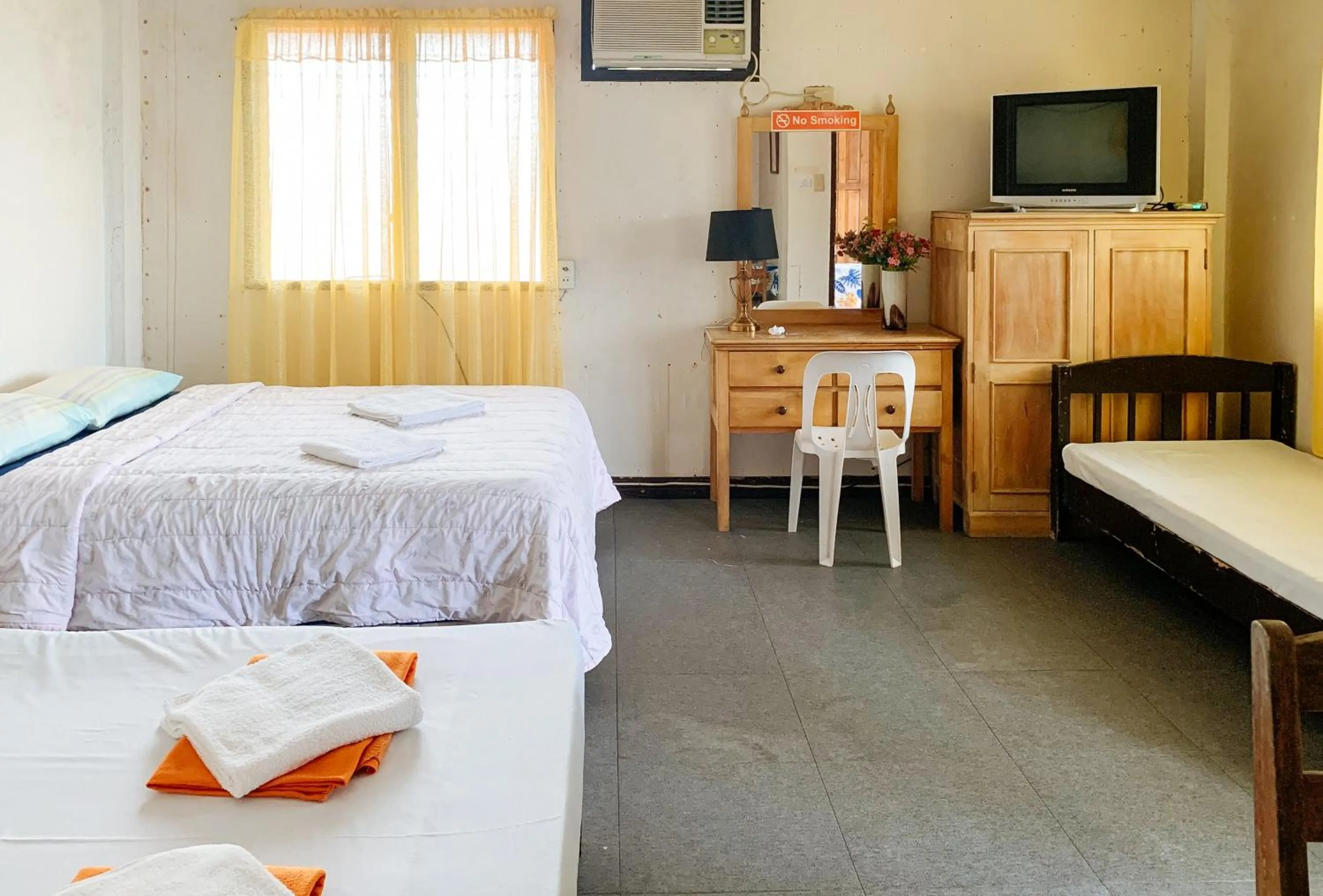 Bed in Carmen Veranda Resort