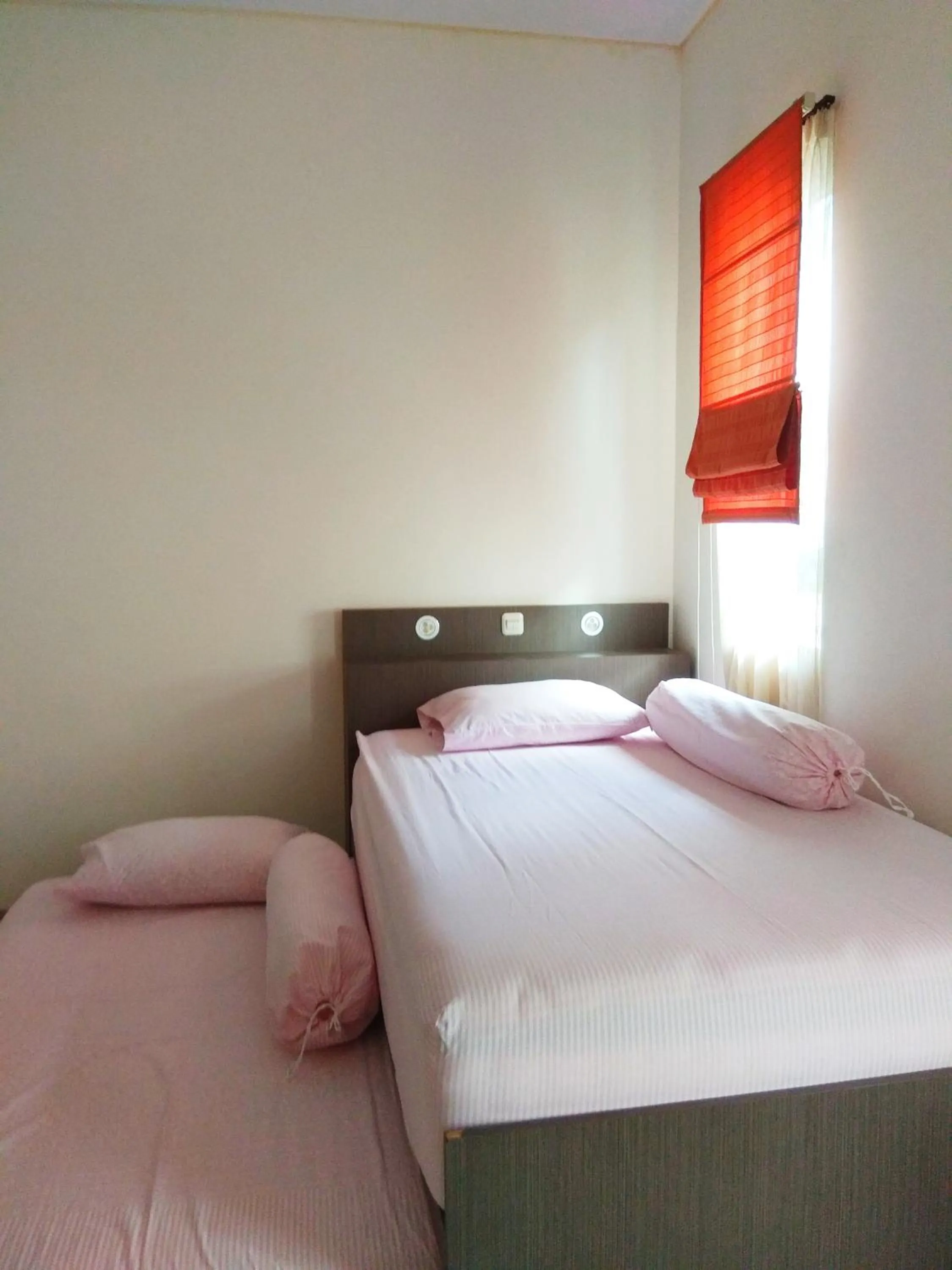 Bed in Omah Dixy Family Homestay by FH Stay
