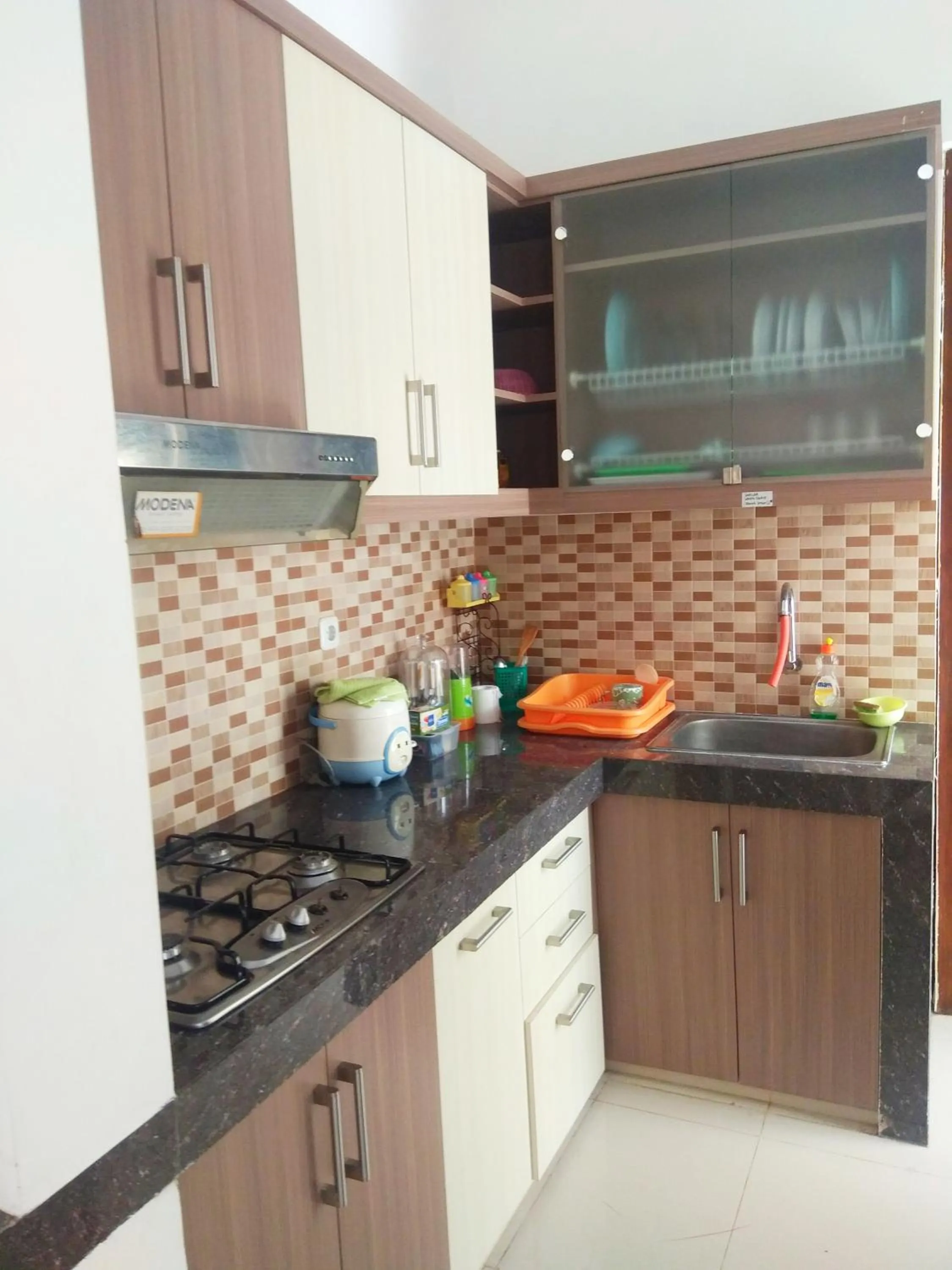 Kitchen or kitchenette in Omah Dixy Family Homestay by FH Stay
